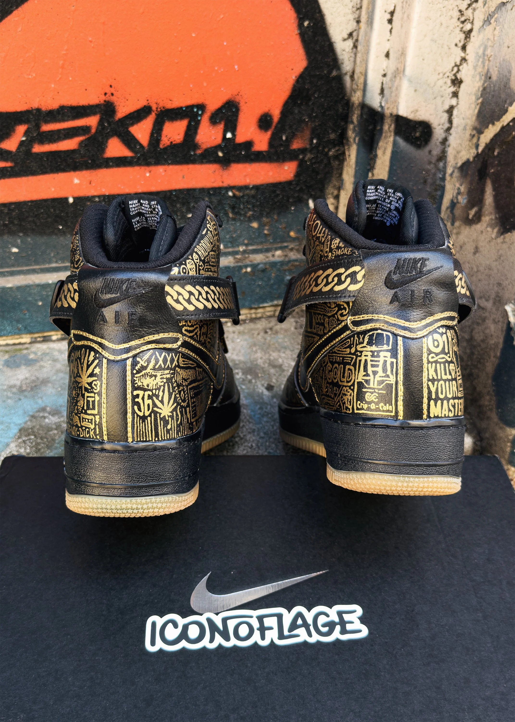 Run the Jewels custom Air Force 1 back view against urban graffiti wall