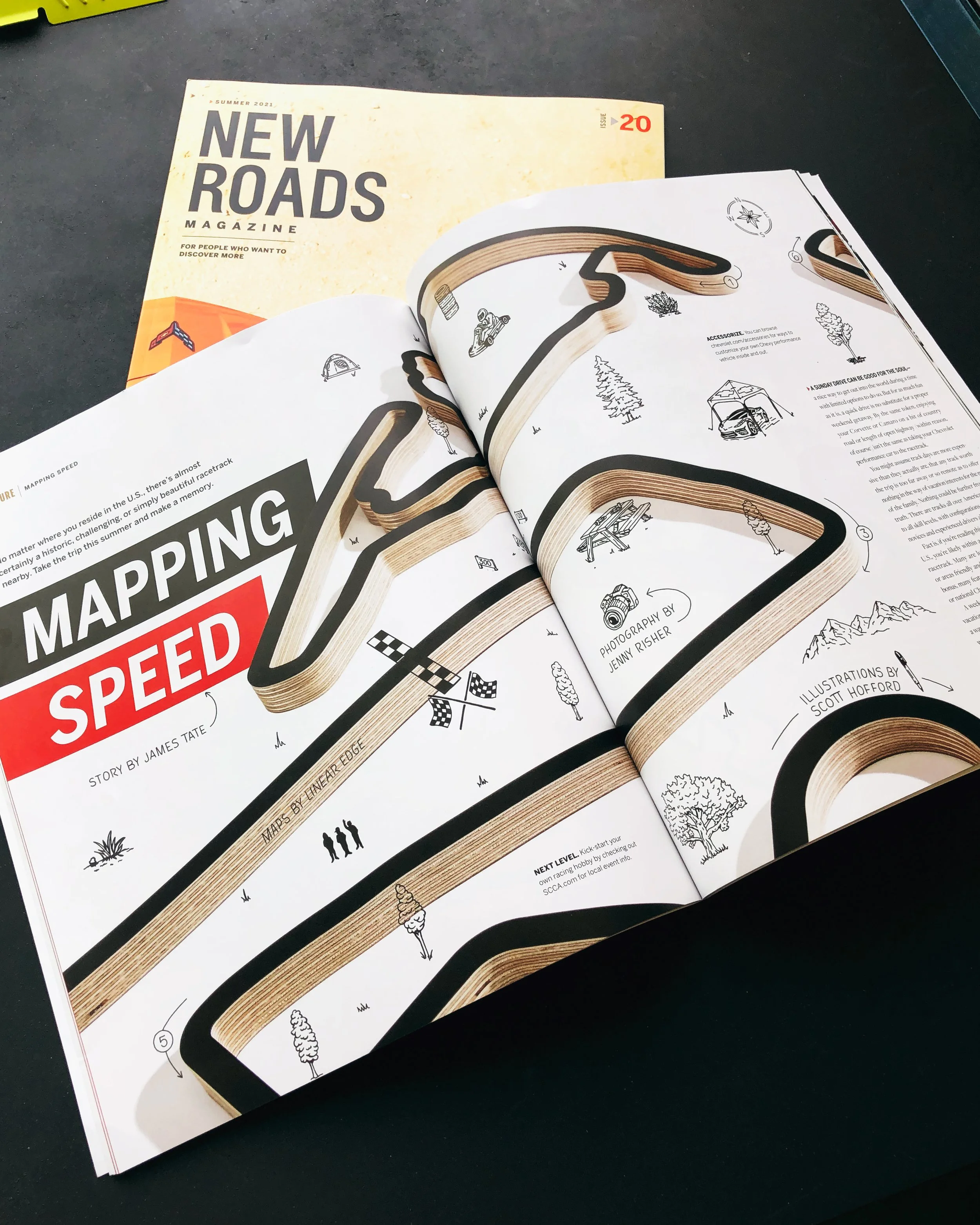 Chevrolet New Roads Magazine spread featuring illustrated racetrack maps