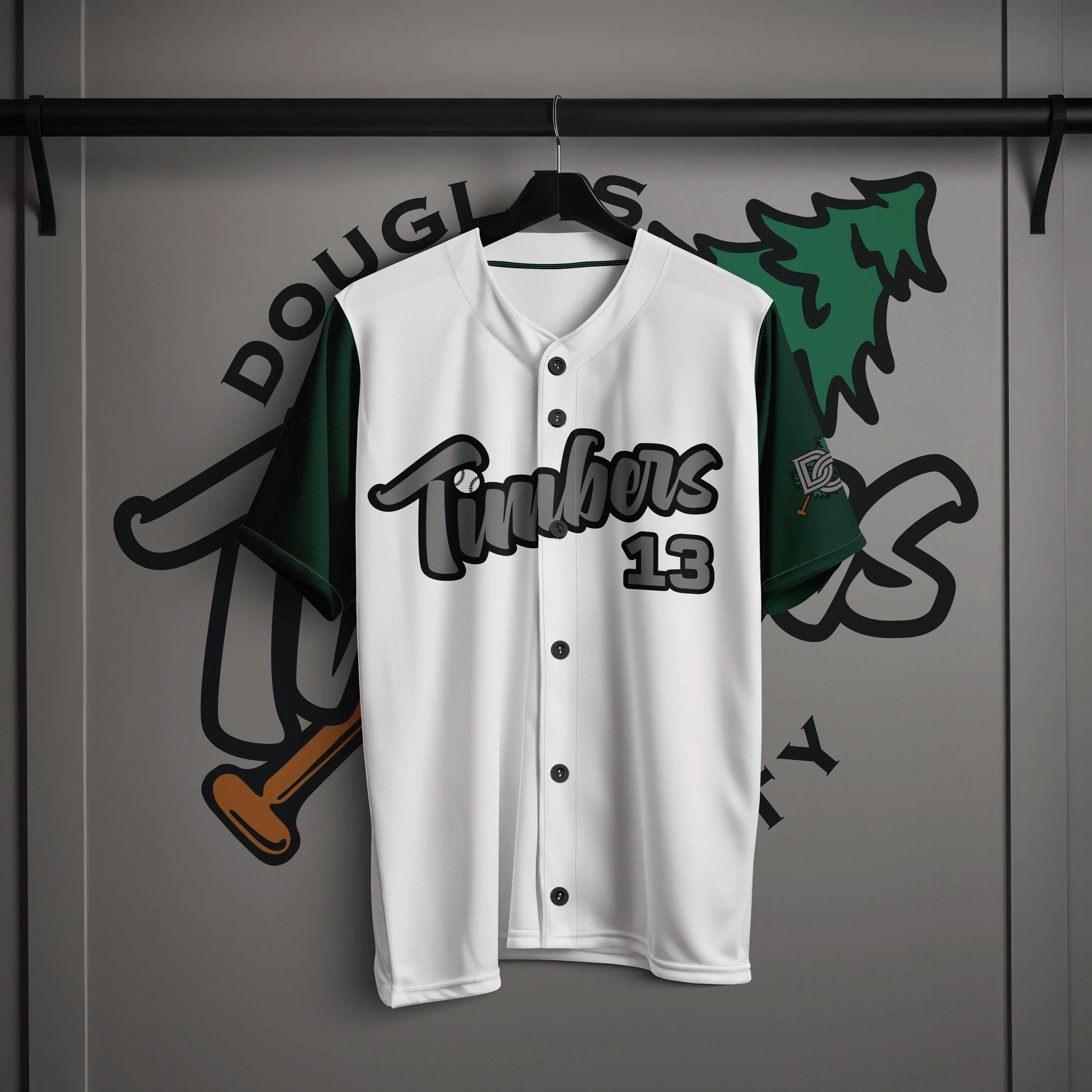 White Douglas County Timbers baseball jersey hanging in locker room with team logo on wall