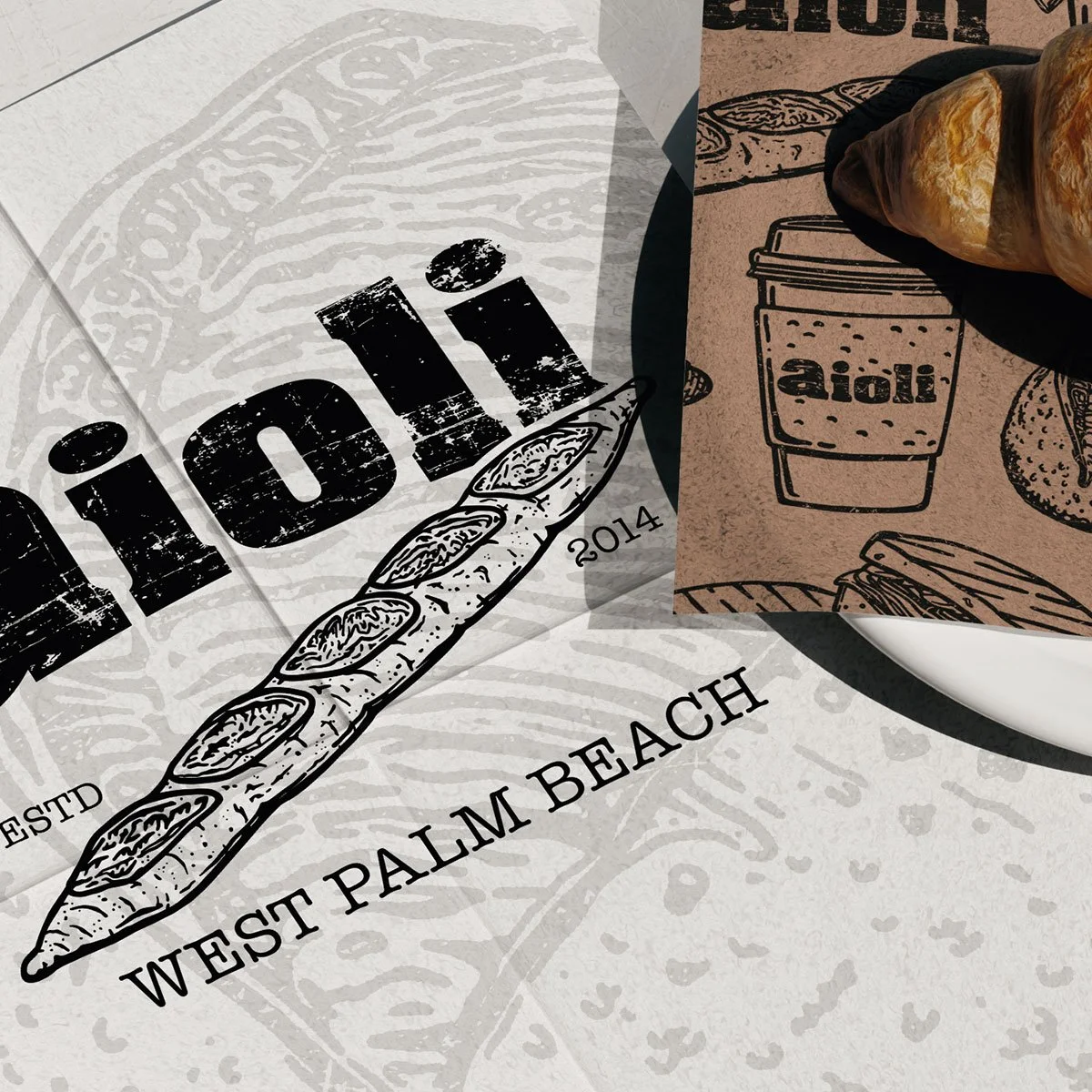 Aioli West Palm Beach bakery branding with custom illustrations on deli paper and menu
