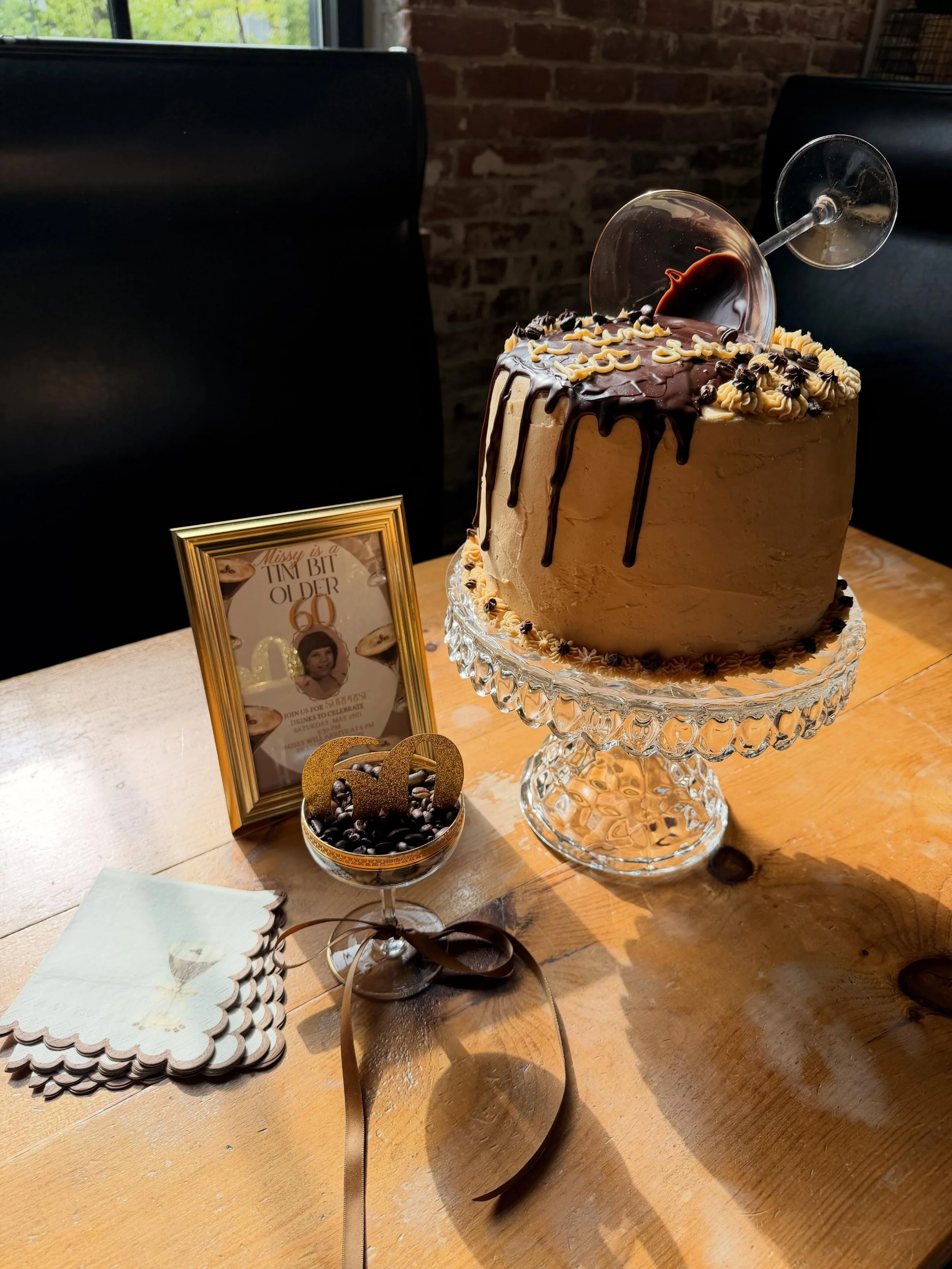 She's just a "tini" bit older 🤎🍸☕️

details, details, details 😍

&bull; hand painted banner
&bull; custom signage from the invitation to everything framed at the event
&bull; personalized drink toppers 
&bull; simple, yet elegant centerp