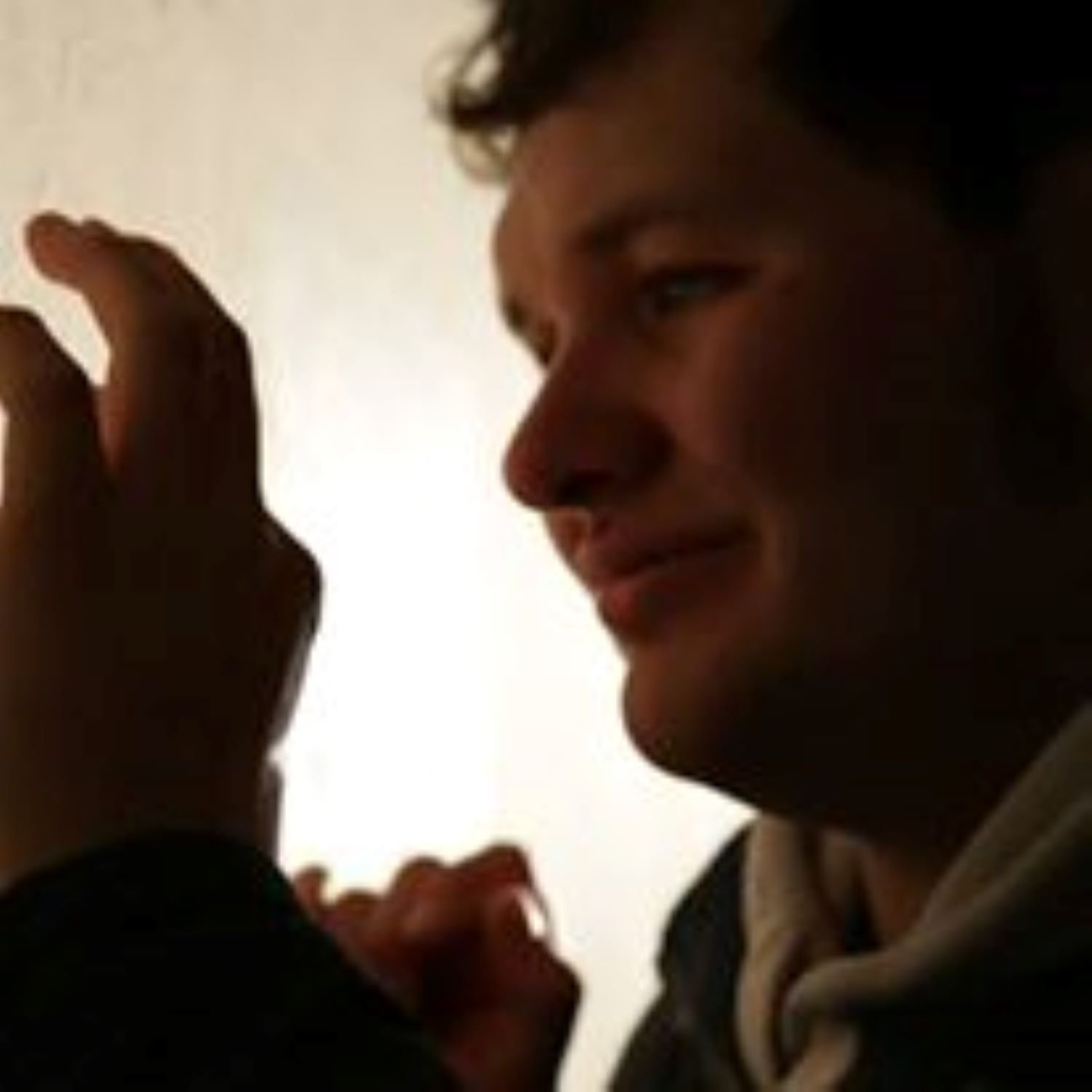 A silhouette of kyle's face, side view