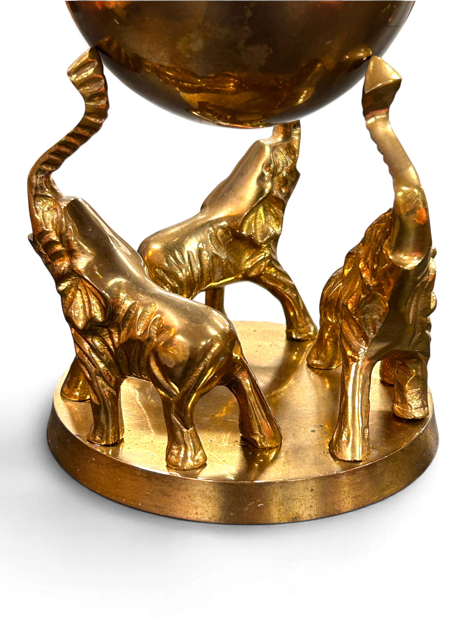 vintage-elephant-globe-sculpture-side-view.png