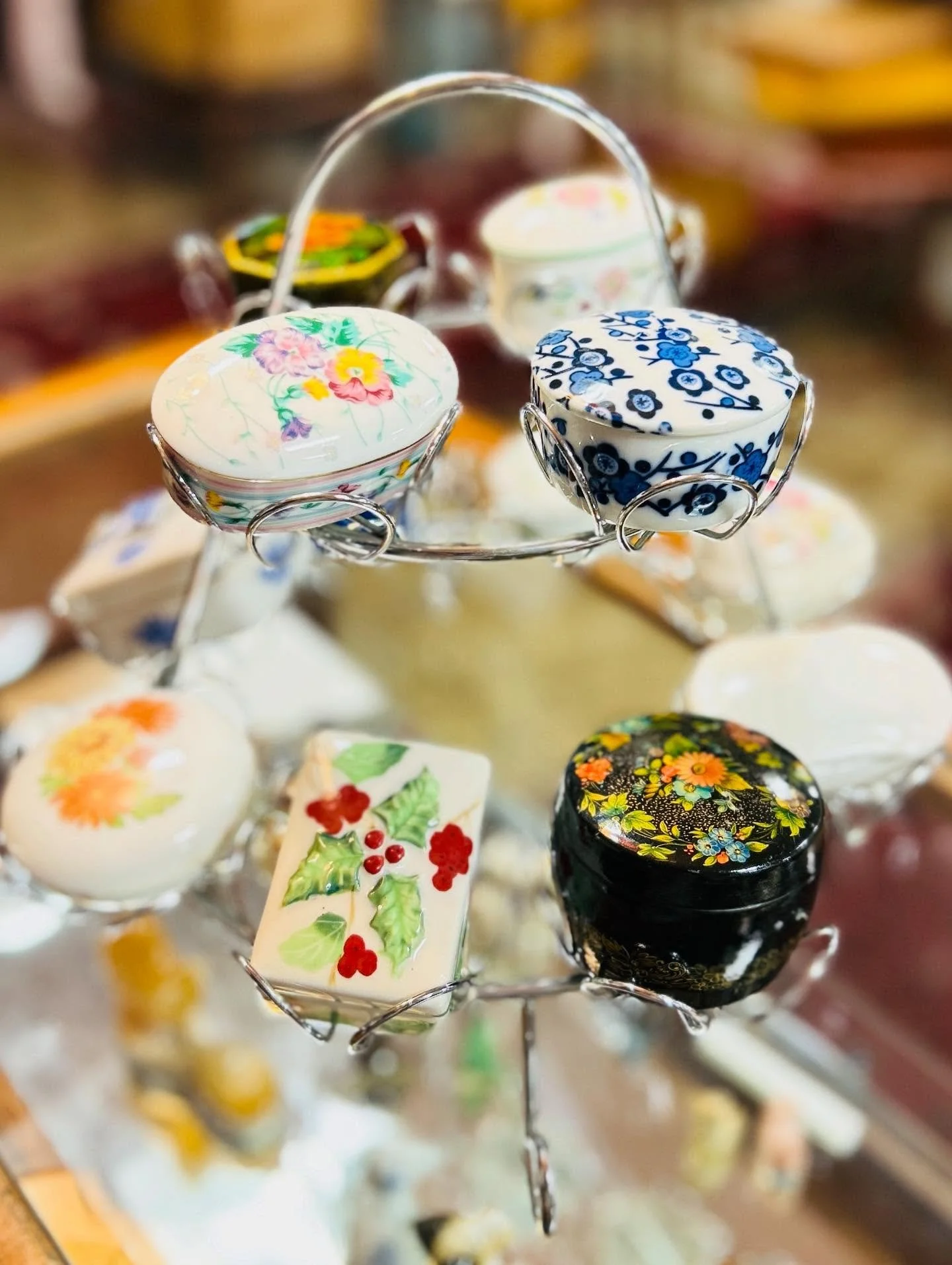A tower of sweets that won&rsquo;t break your New Years Resolutions. Tiny treasures to hold your tinier treasures. From Lefton to Limoge, Sadek &amp; Minton our collection of trinket boxes won&rsquo;t break the bank and make a great gift for a mom, a