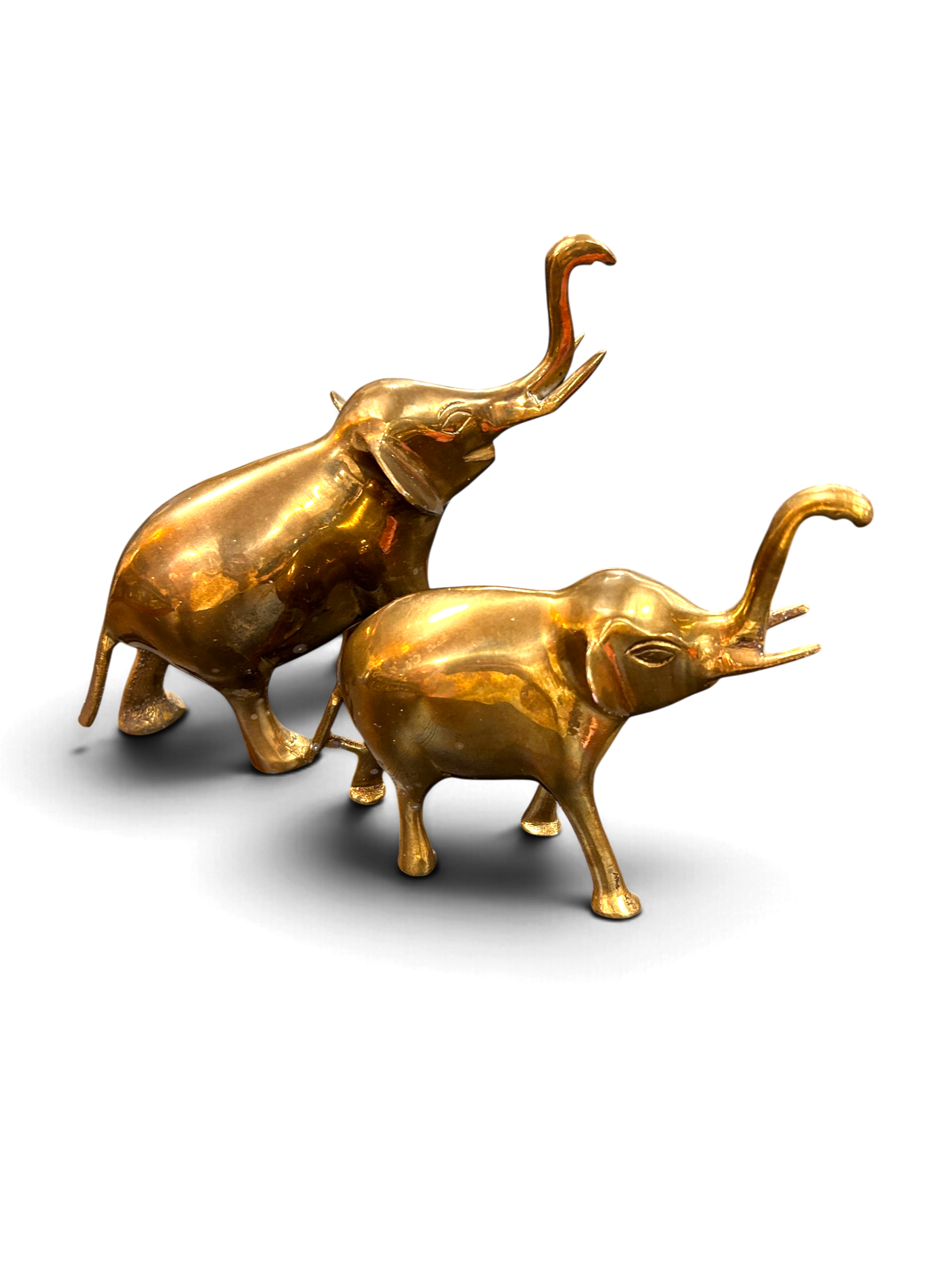 vintage-brass-elephant-sculptures-side-view.png