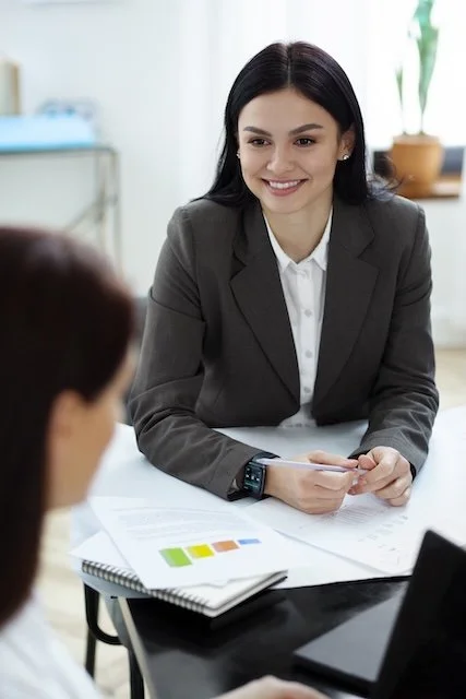 Interview coach conducting a mock interview session with a client
