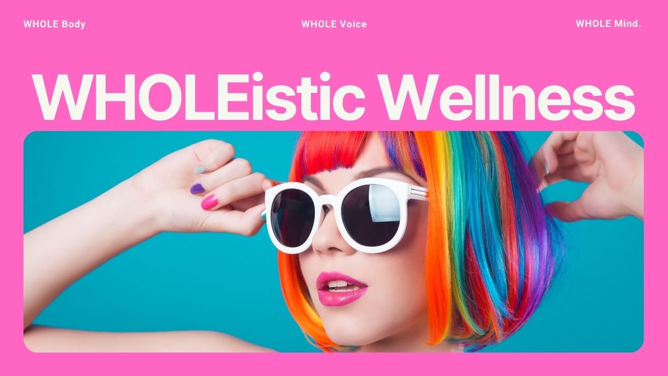 A woman with rainbow-colored hair wearing white sunglasses against a teal background. The top of the image has pink background with white and purple text that reads 'WHOLE Body,' 'WHOLE Voice,' 'WHOLE Mind.' and 'WHOLEistic Wellness.'.
