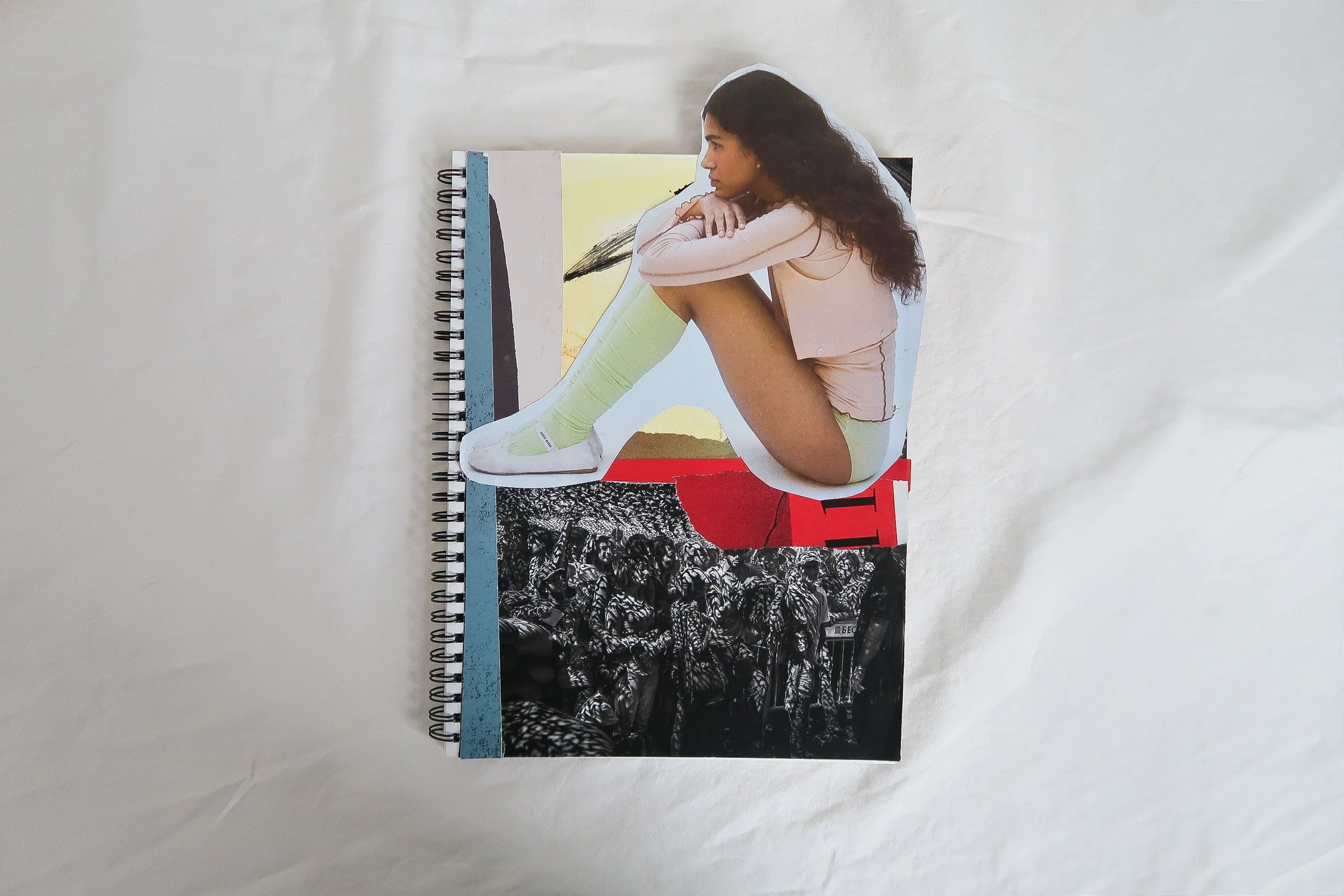 A collage featuring a woman sitting with her knees pulled to her chest, wearing a pink jacket, white shorts, and lime green knee-high socks, with a background collage of black and white protest photography, colorful abstract patterns, & magazine text