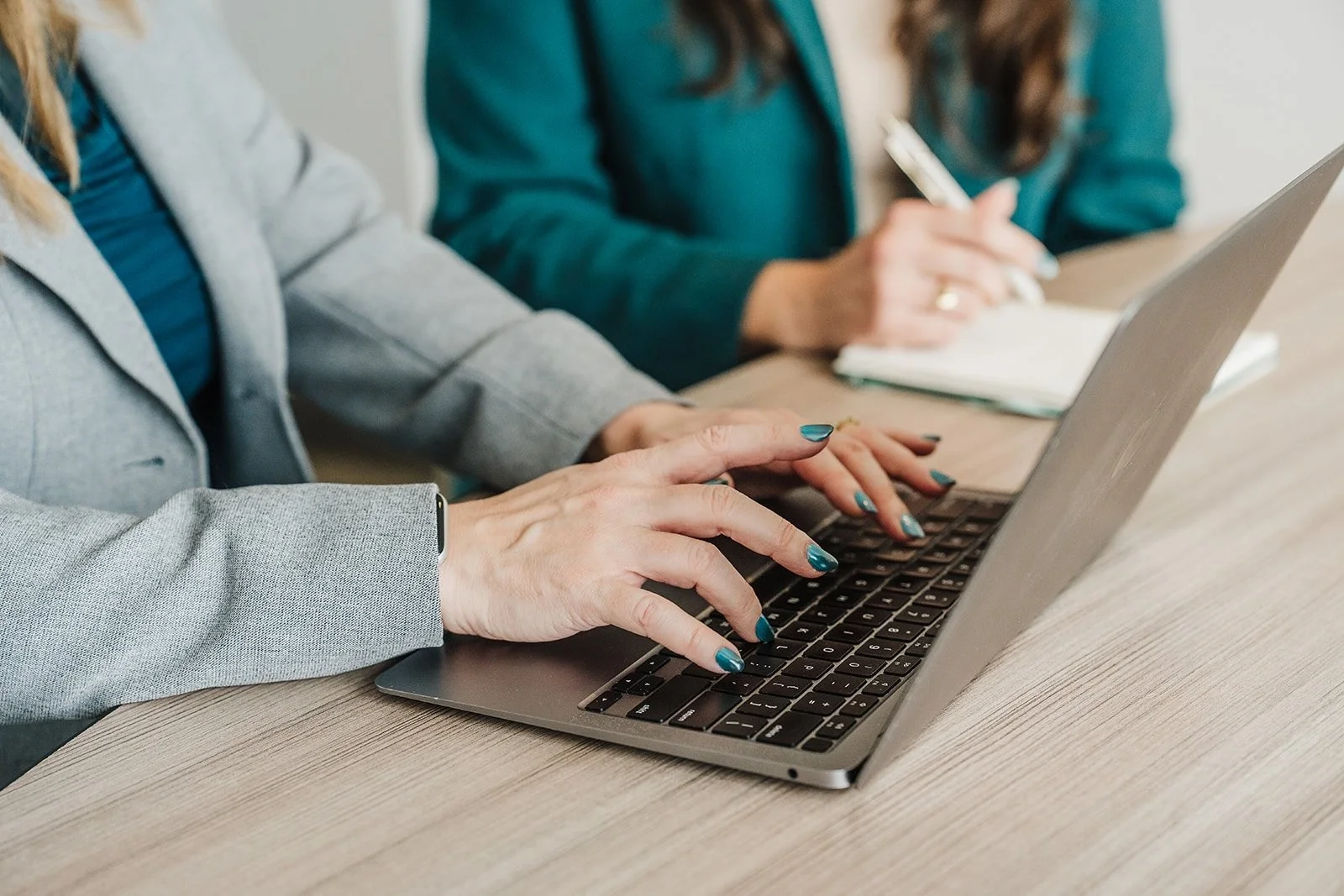 Professional coach conducting leadership development with digital resources