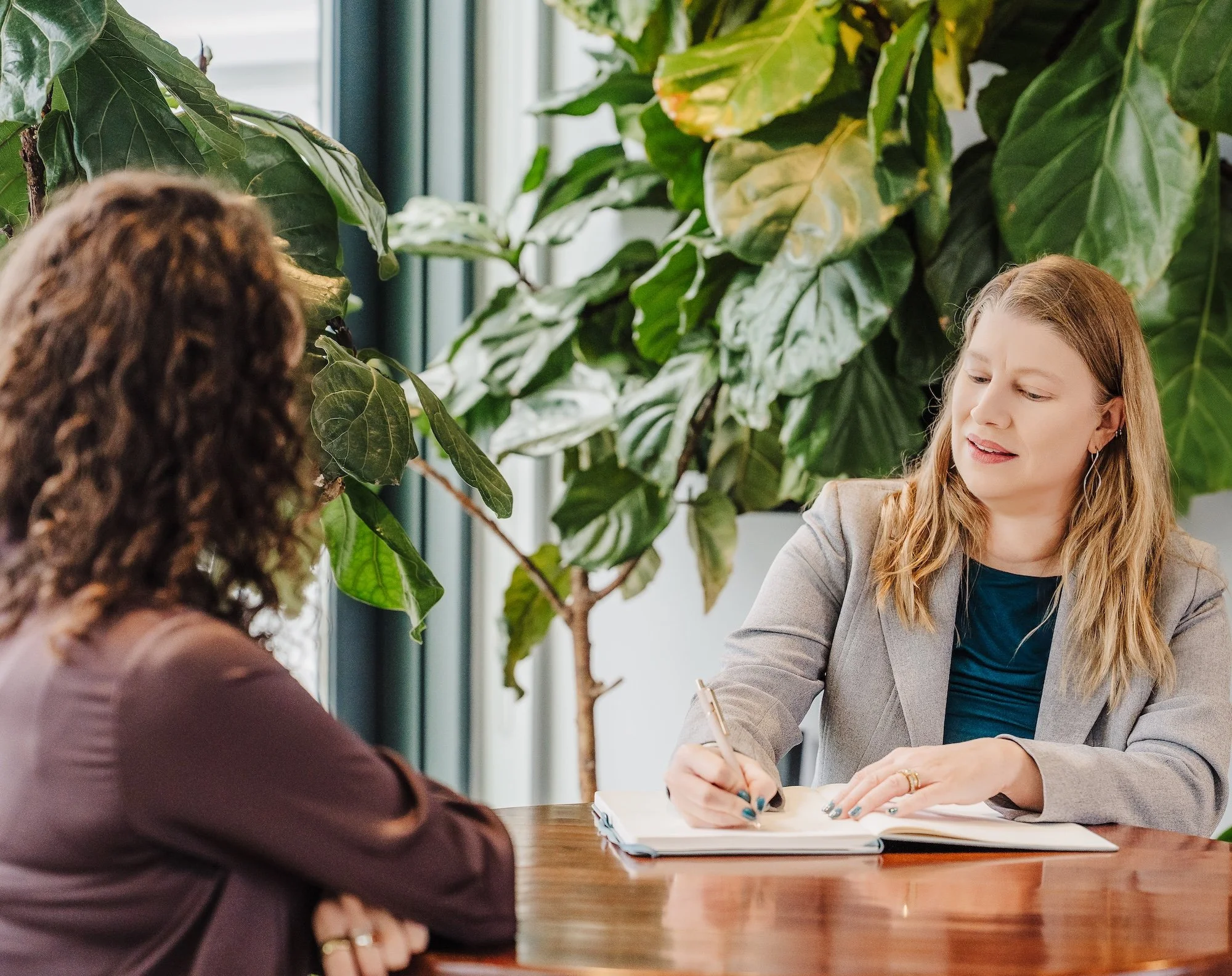 Senior executive coach leading strategic leadership development conversation