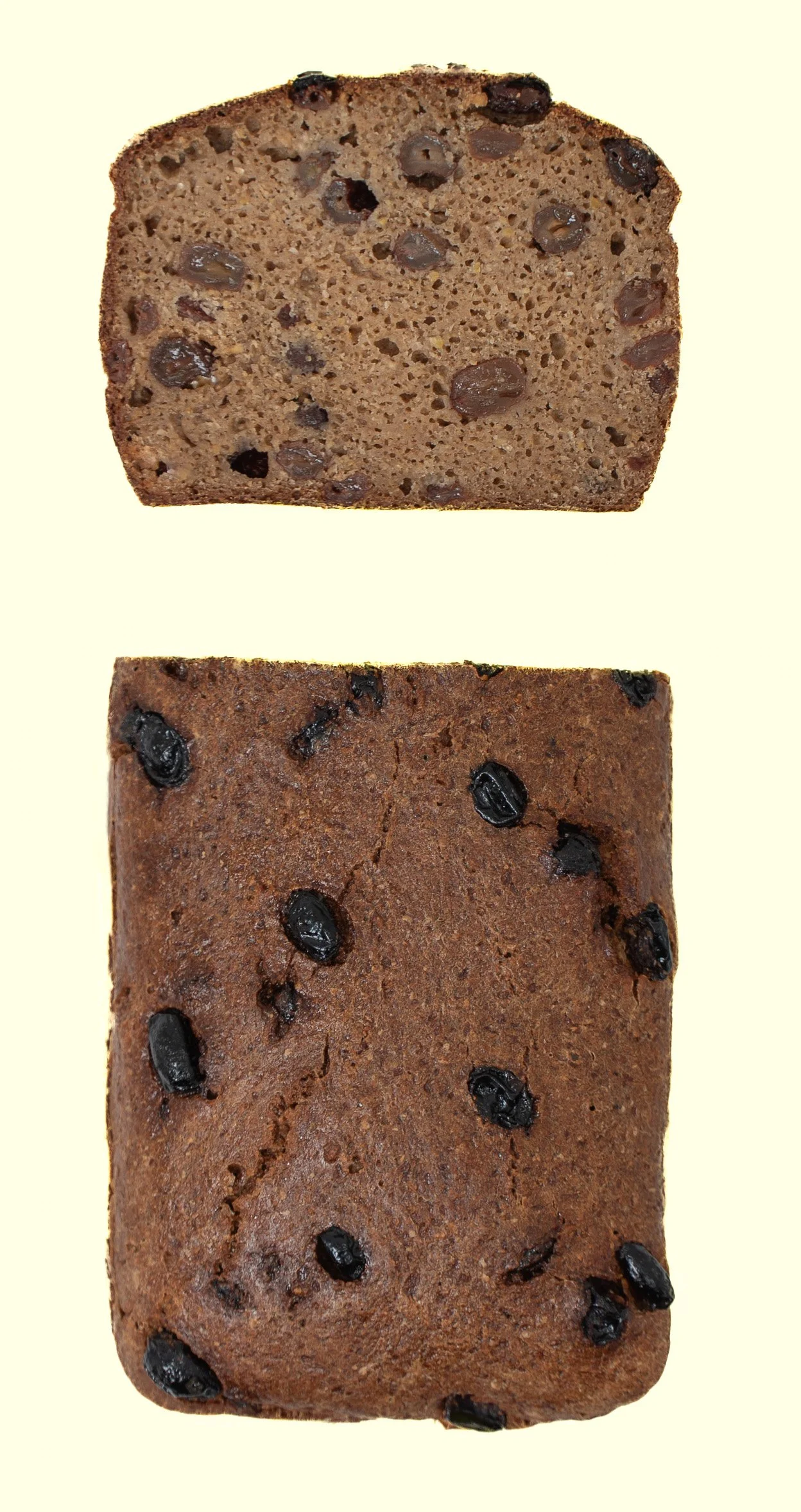 Image showing two pieces of chocolate chip banana bread, one sliced and one whole.