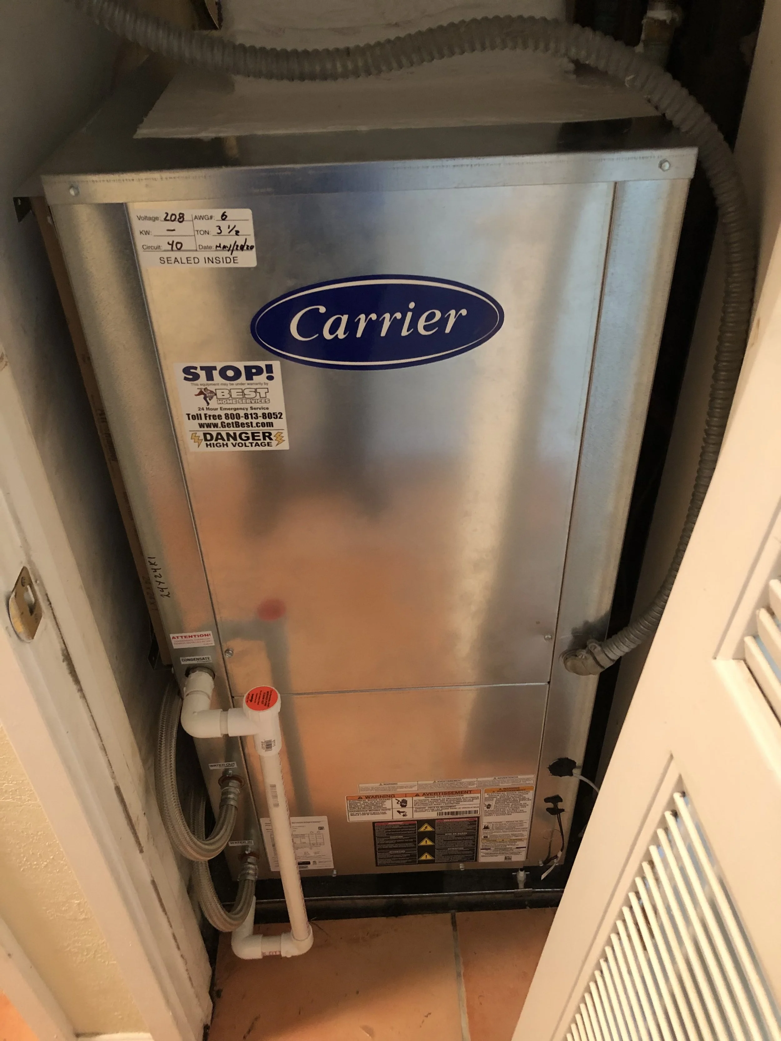 Carrier indoor air handler installed as part of a full HVAC system replacement in Miami, FL. Ensured optimal airflow, humidity control, and system reliability.