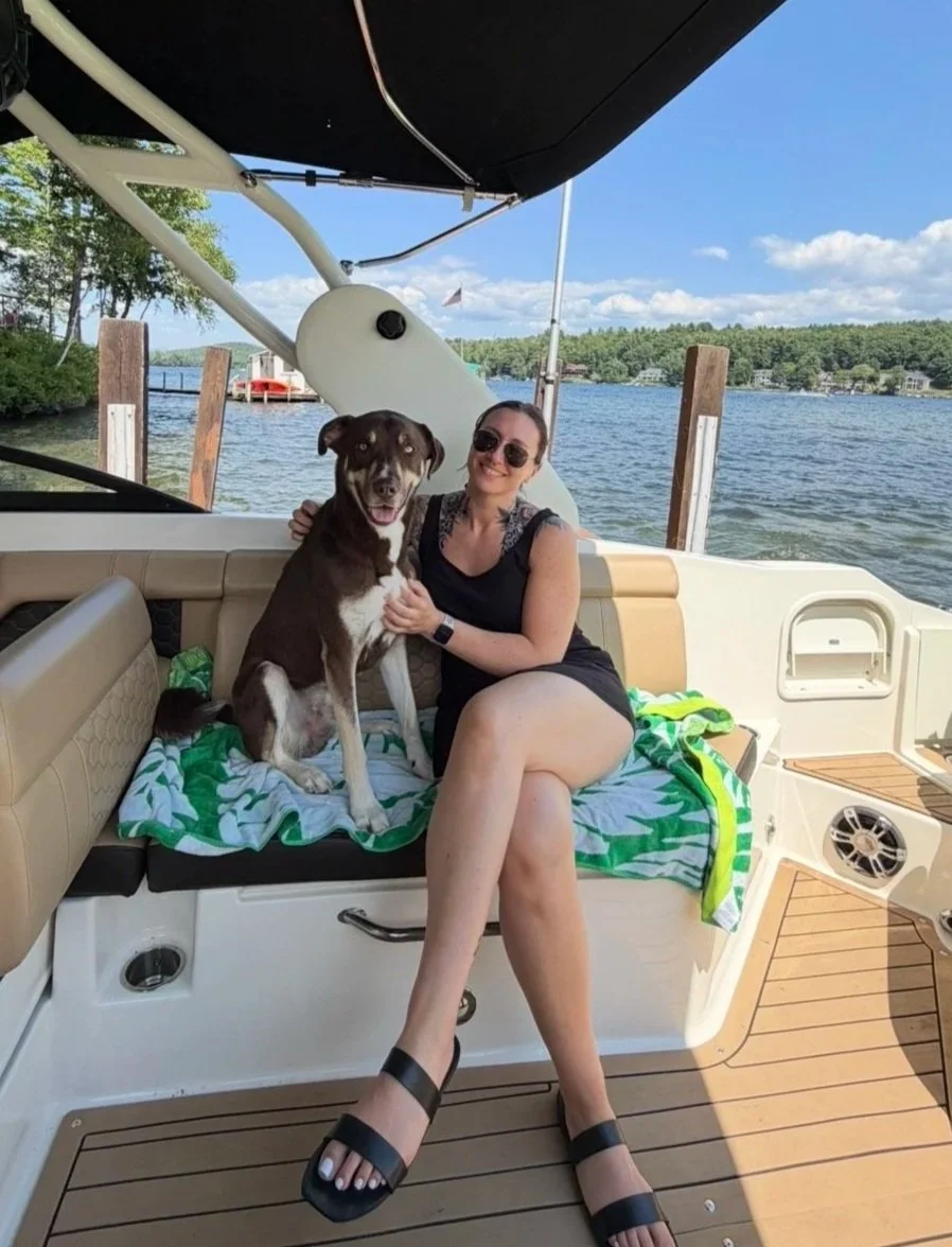 Natalie, Certified Personal Trainer and Nutrition Coach at Next Level Coaching, with her dog.
