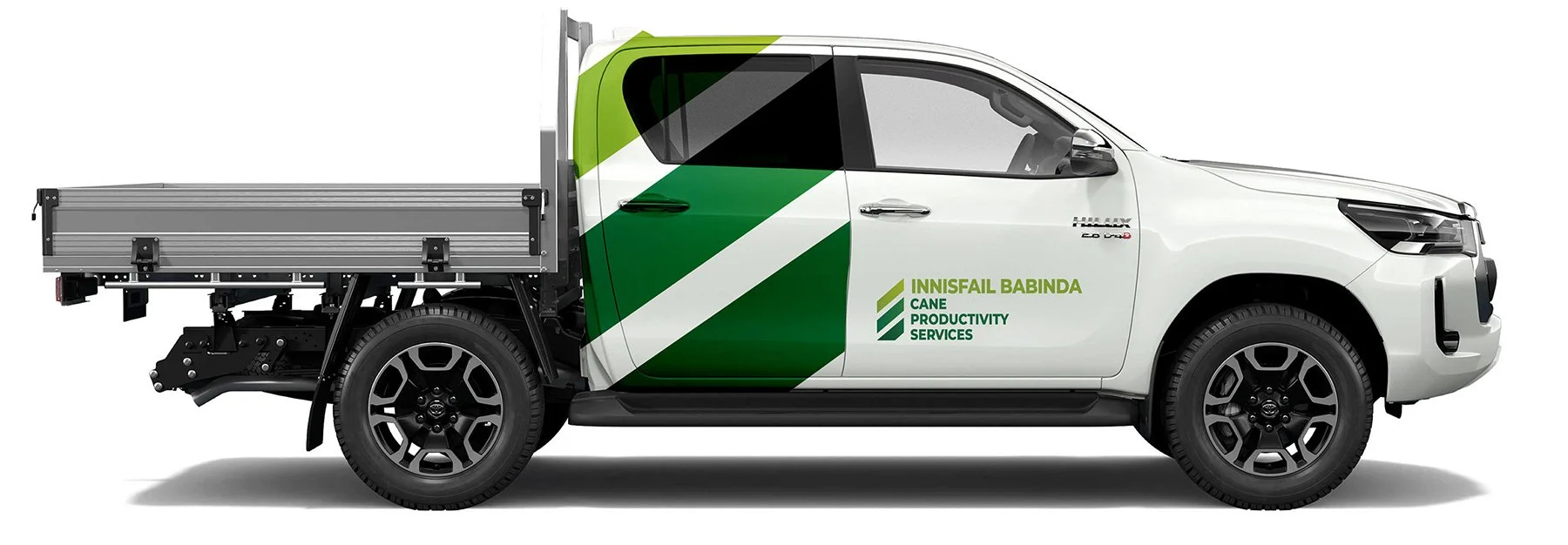 Innisfail Babinda Cane Productivity Services branded Toyota Hilux ute with green agricultural graphics and company logo, representing cane farming support services in North Queensland.