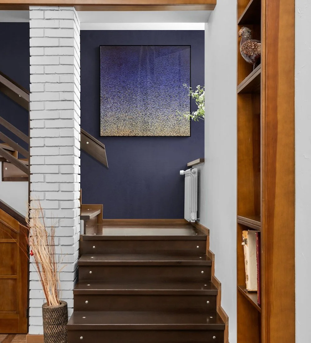 wooden-staircase-filled-with-natural-light.jpeg