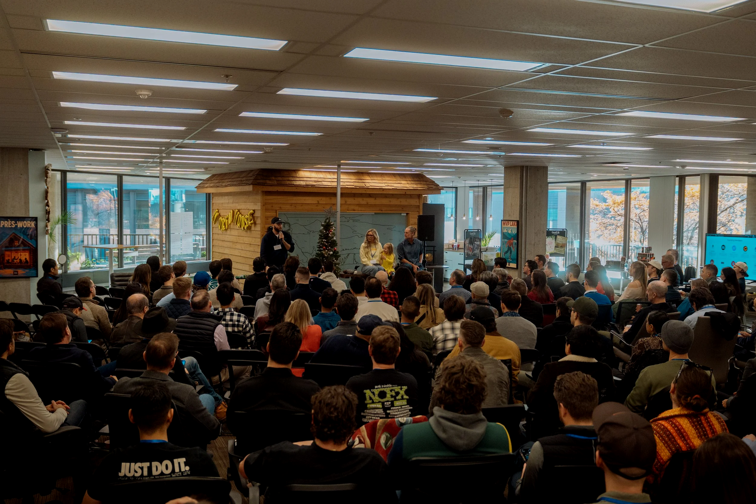 Founders and guests gathered around a panel conversation at North House