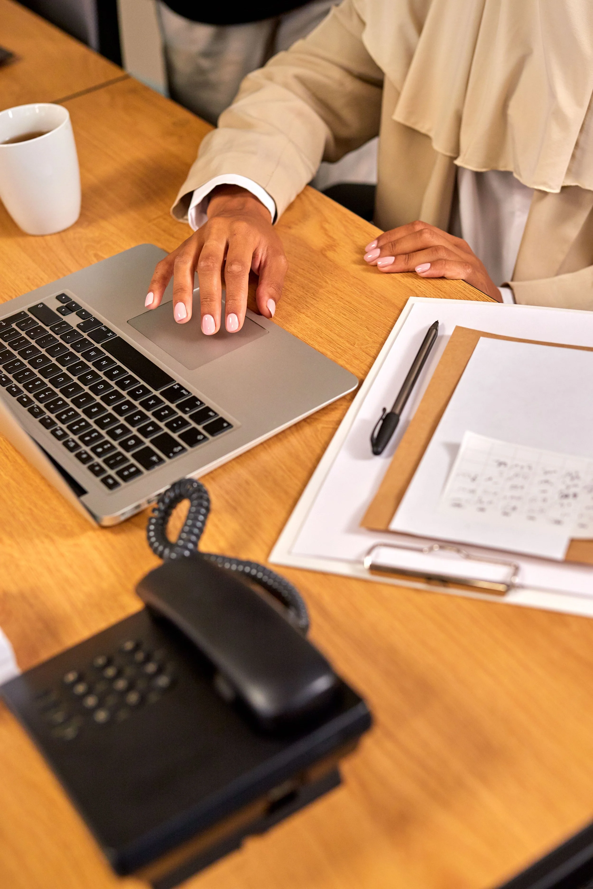 Professional Black woman at her desk — the hidden weight of mental health stigma in high-achieving communities