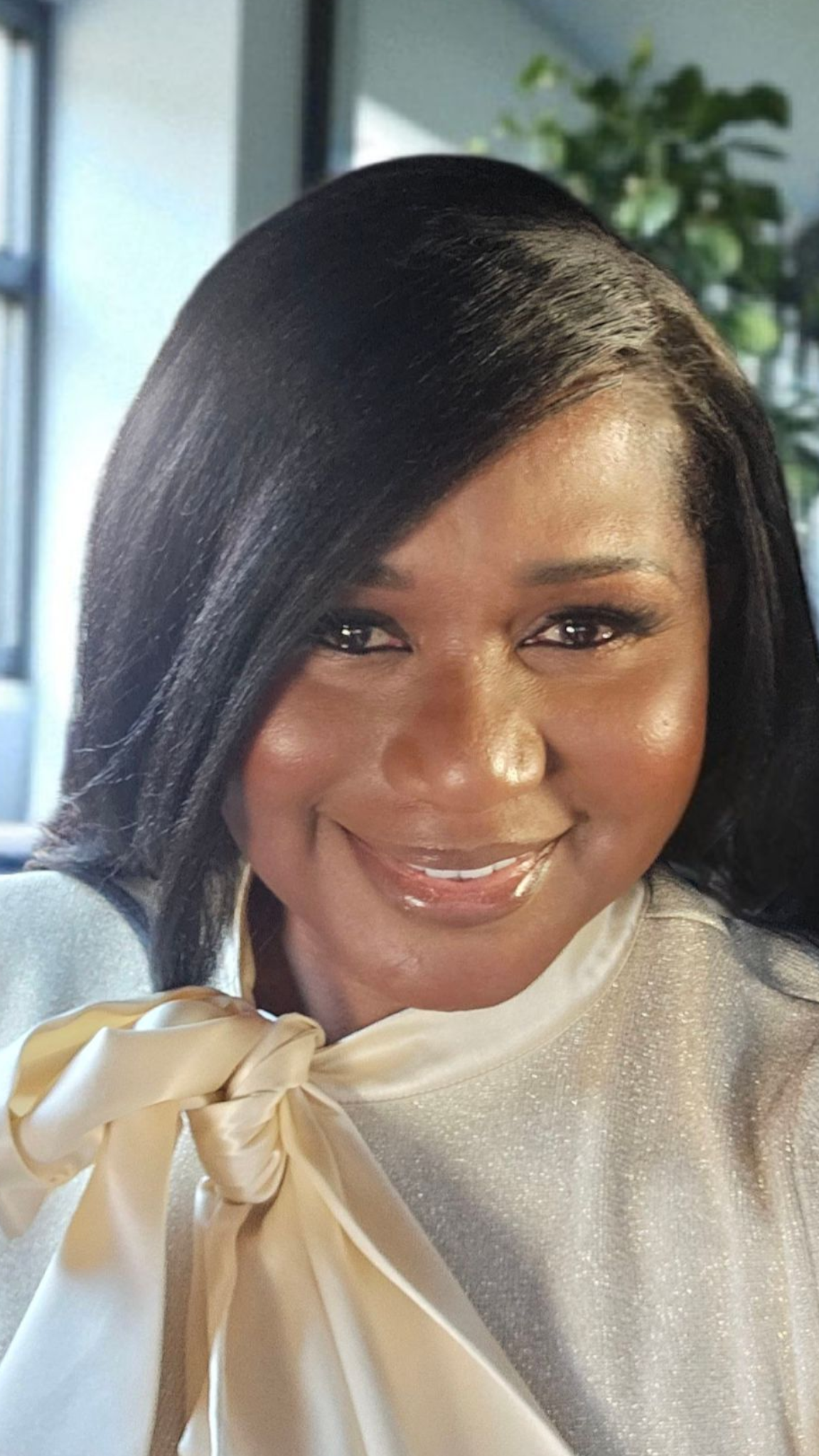 Dr. Sarah Williams smiling in a professional headshot, welcoming high-achieving clients.