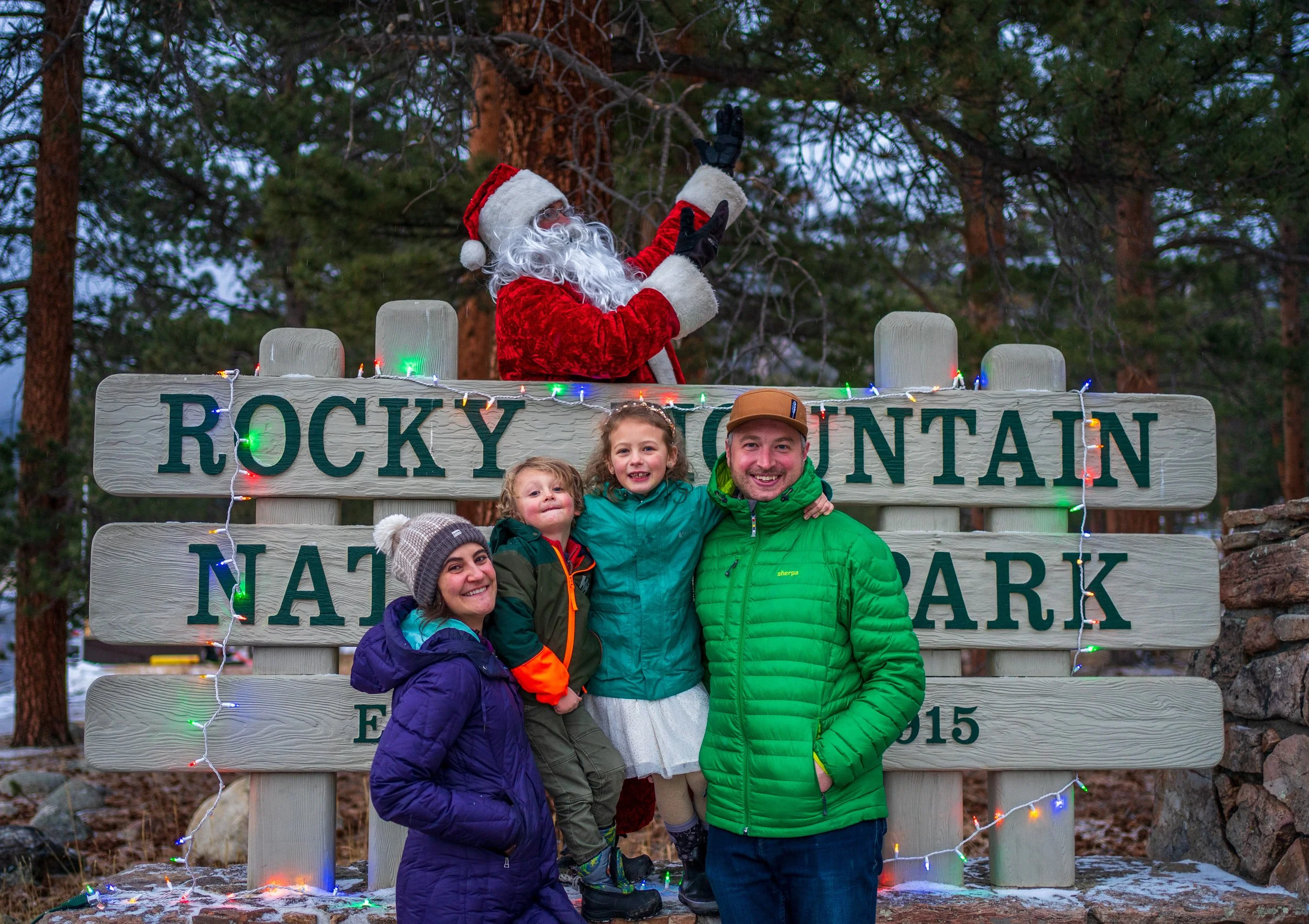 santa w family at rmnp sign.jpg