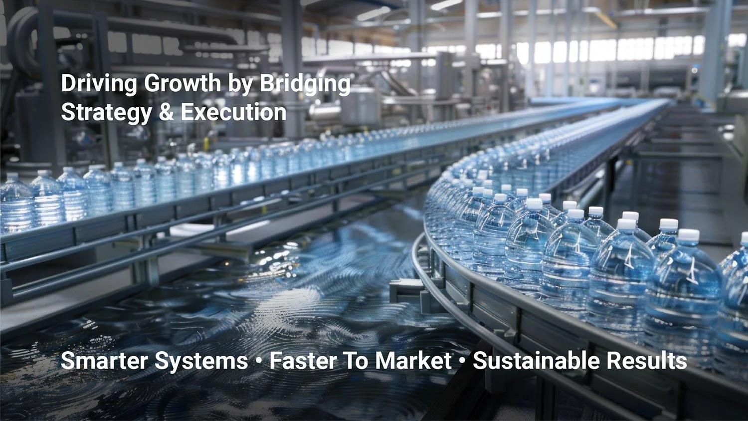 Streamlined production in action—precision-driven processes ensuring consistent quality at every stage.

Image is a factory conveyor line with bottled water moving through an industrial processing plant.