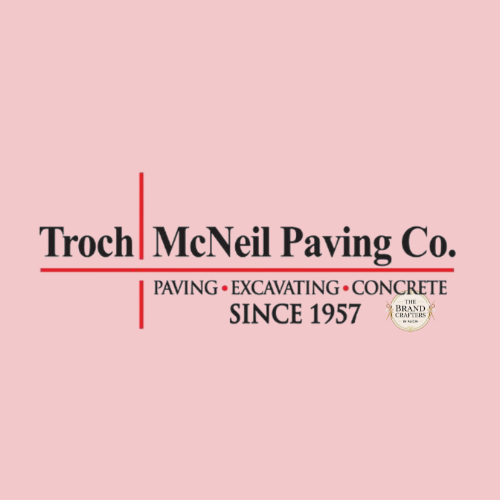 Logo of Troch McNeil Paving Co. with text 'Paving, Excavating, Concrete Since 1957' and a small emblem reading 'The Brand Building'.