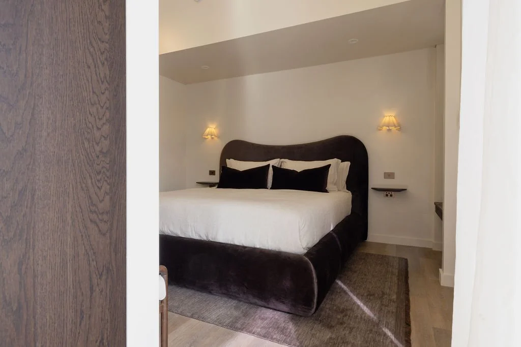 Sink into your custom king bed, layered with 100% flax linen for slow mornings and restorative nights.