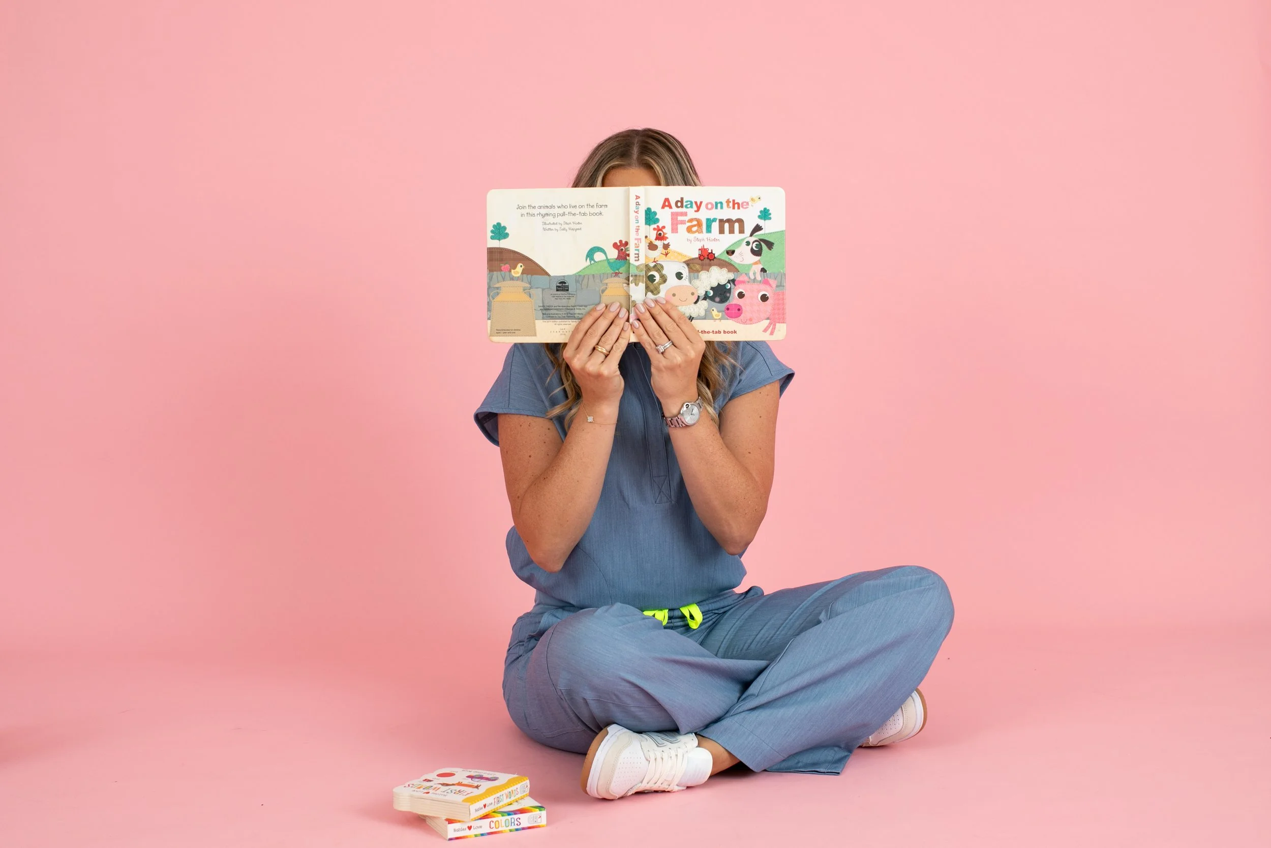 blonde girl reading book