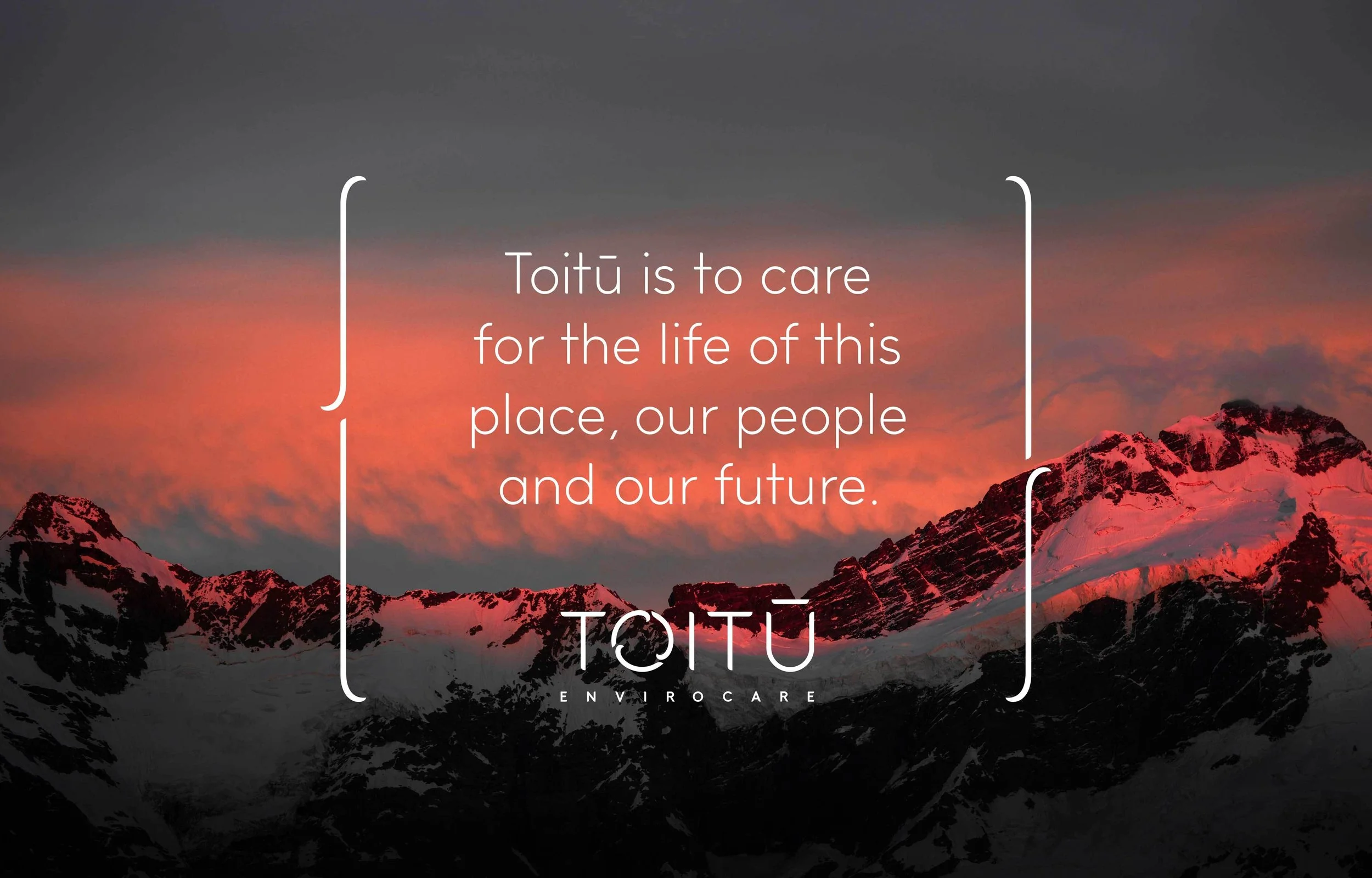 Sunset over snow-capped mountains with a quote about caring for the land and people.