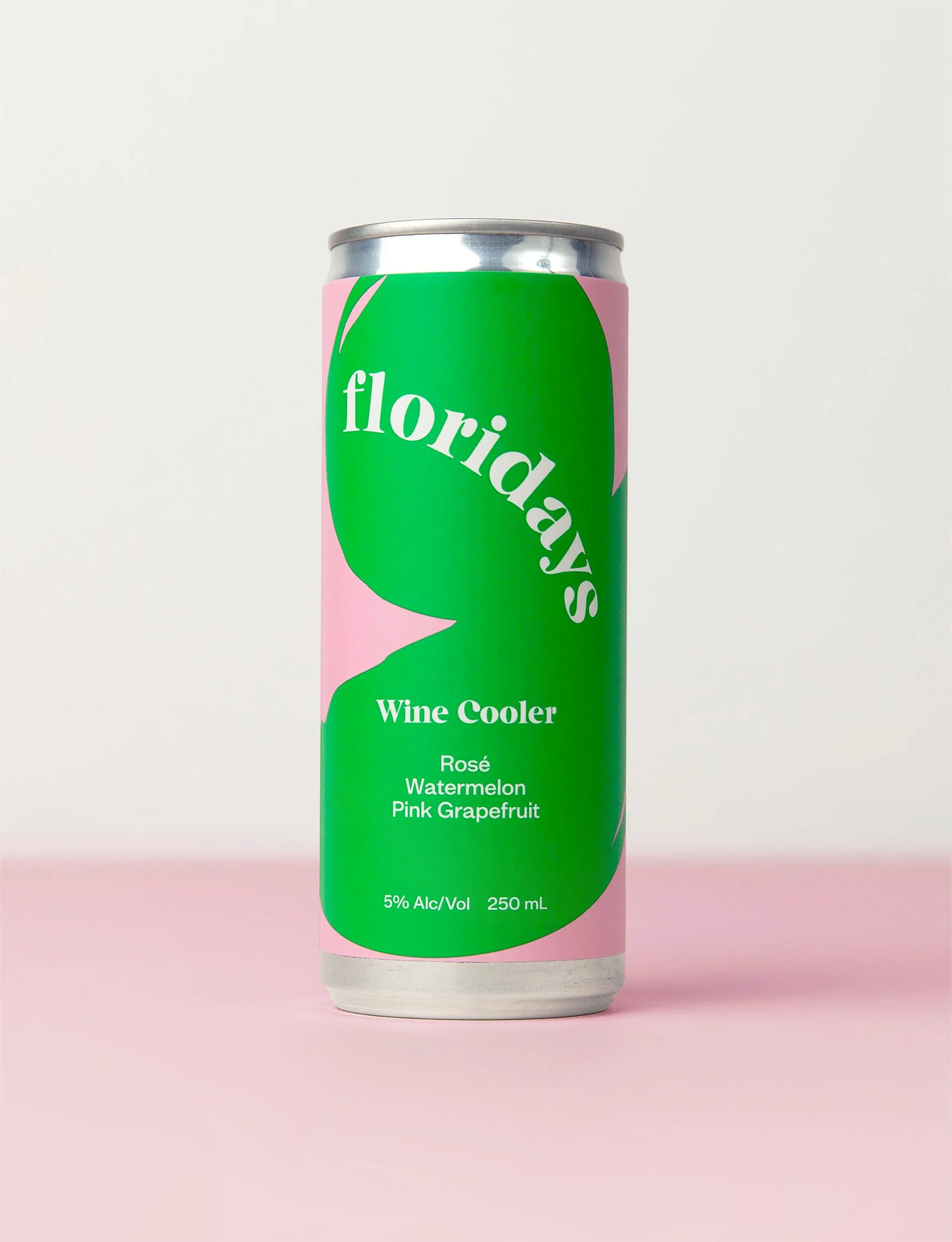 A 250 mL can of Floridays wine cooler with a pink, green, and white design, labeled with flavors including rosé, watermelon, and pink grapefruit, containing 5% alcohol.