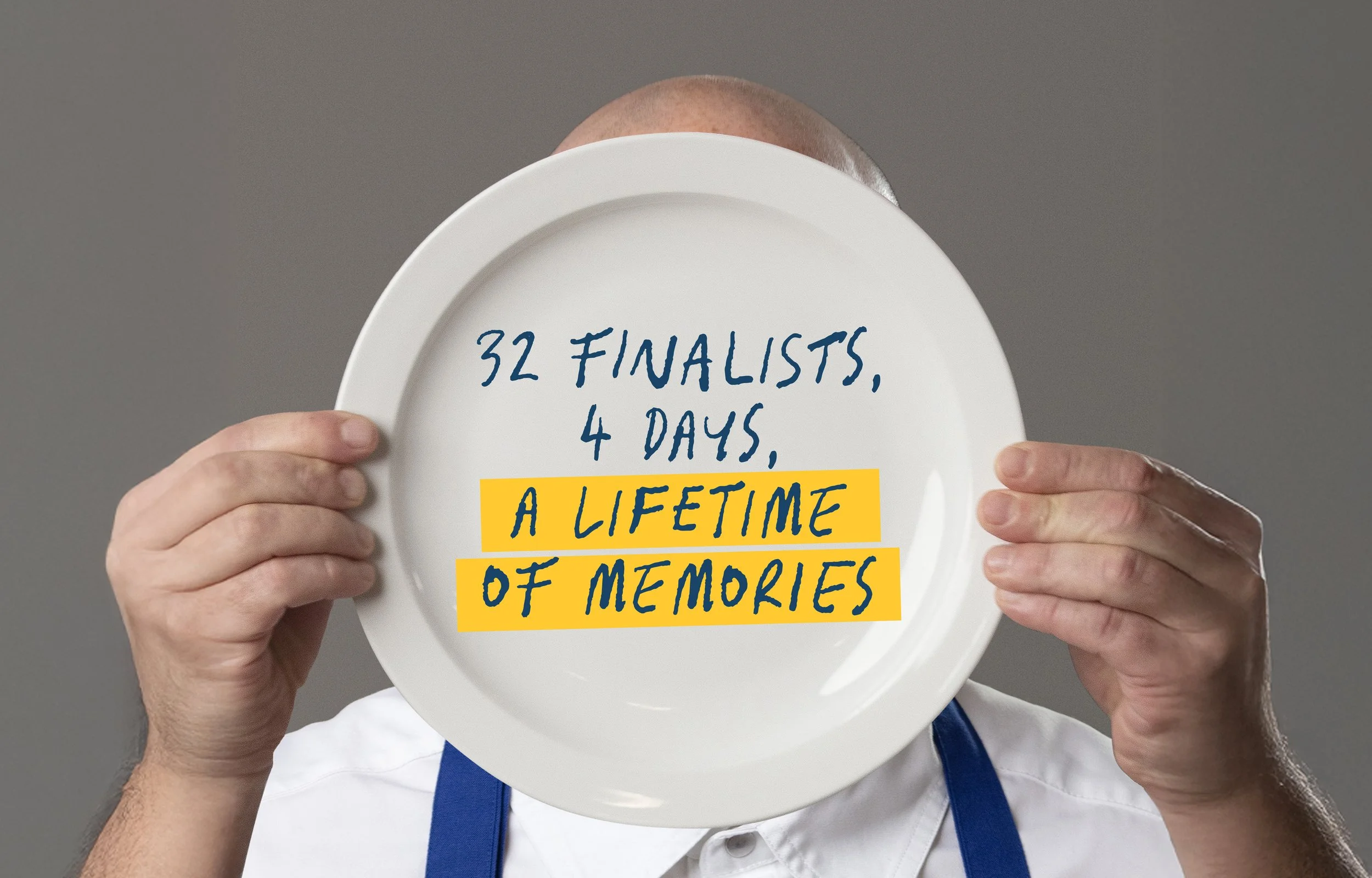 Person holding a white plate with the text '32 finalists, 4 days, a lifetime of memories' written on it in blue and yellow handwriting.