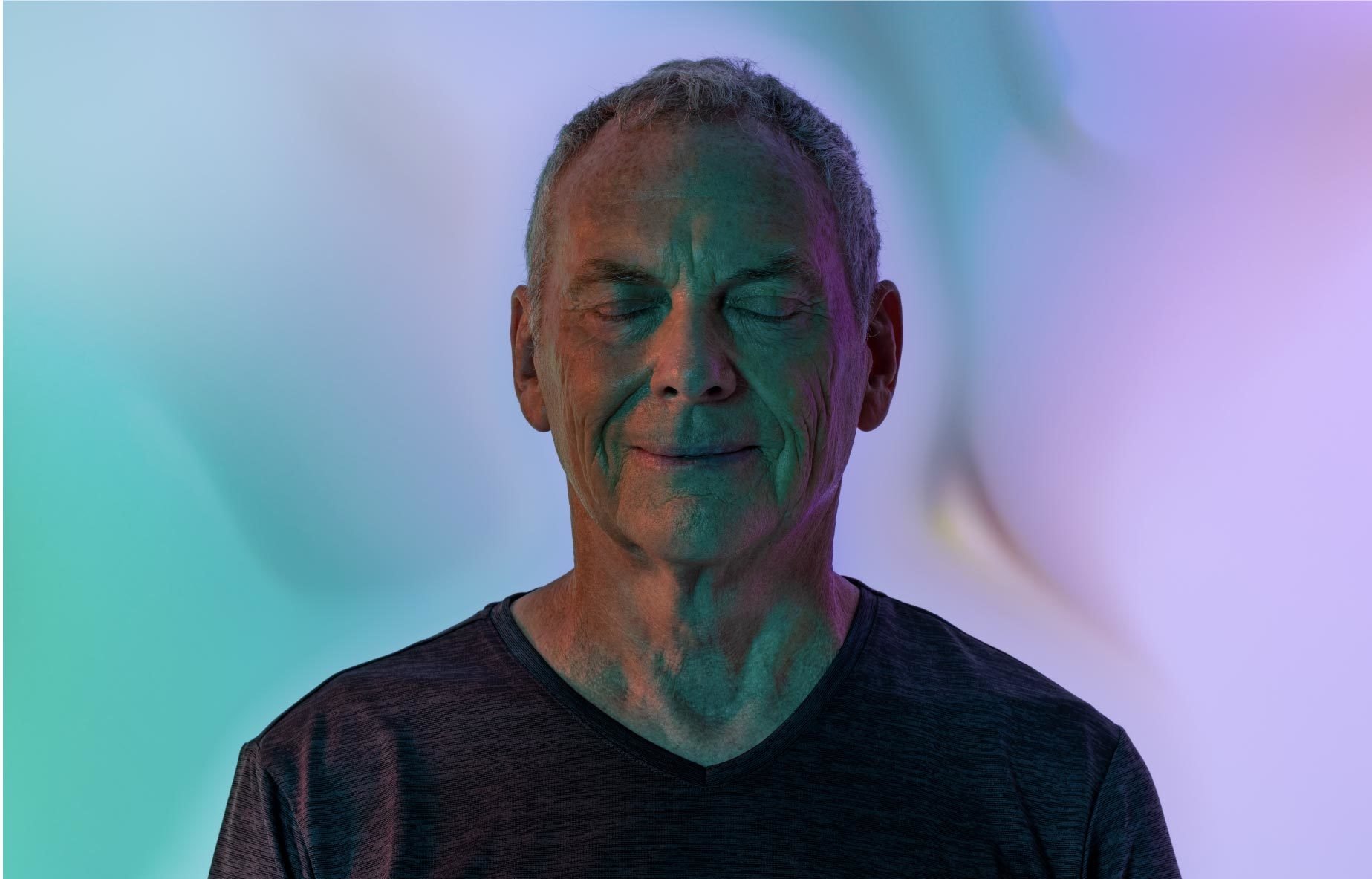 Senior man meditating for Nutiani brand photo shoot.