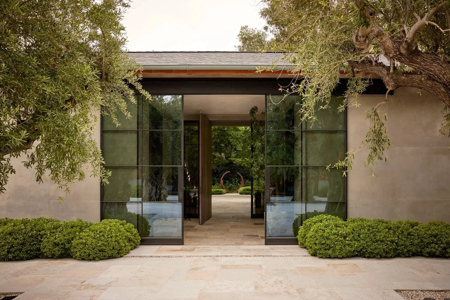 steel-glass-entry-olive-trees.jpg