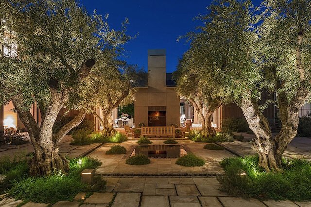 evening-courtyard-fireplace-olives.jpg