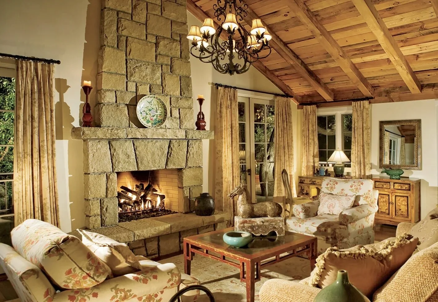 timber-ceiling-stone-fireplace-living.jpeg