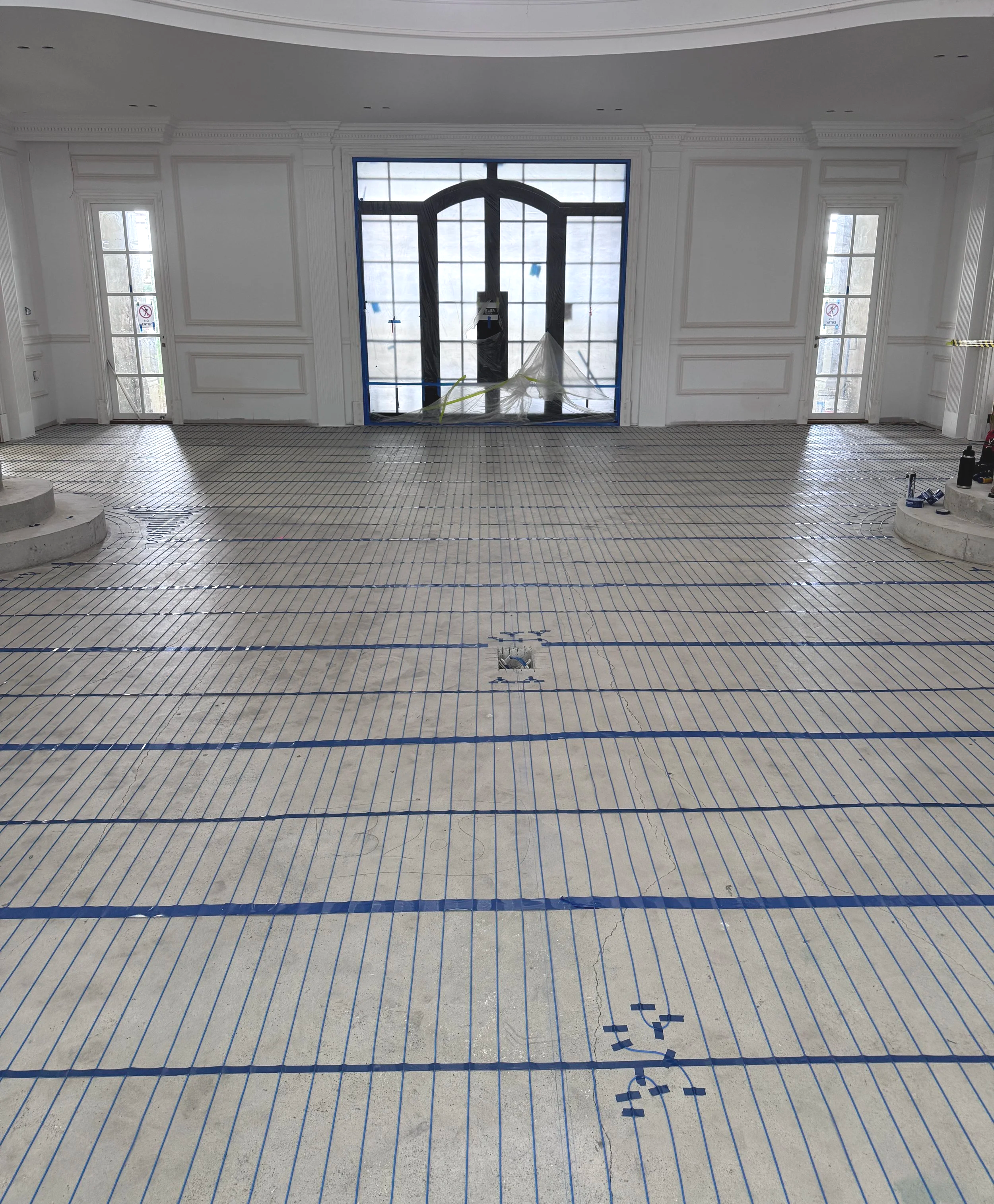Hotwire floor heating, floor heating installation, floor heating installer, Electrician installer floor heat, heating floor laying, cables for heating floor.