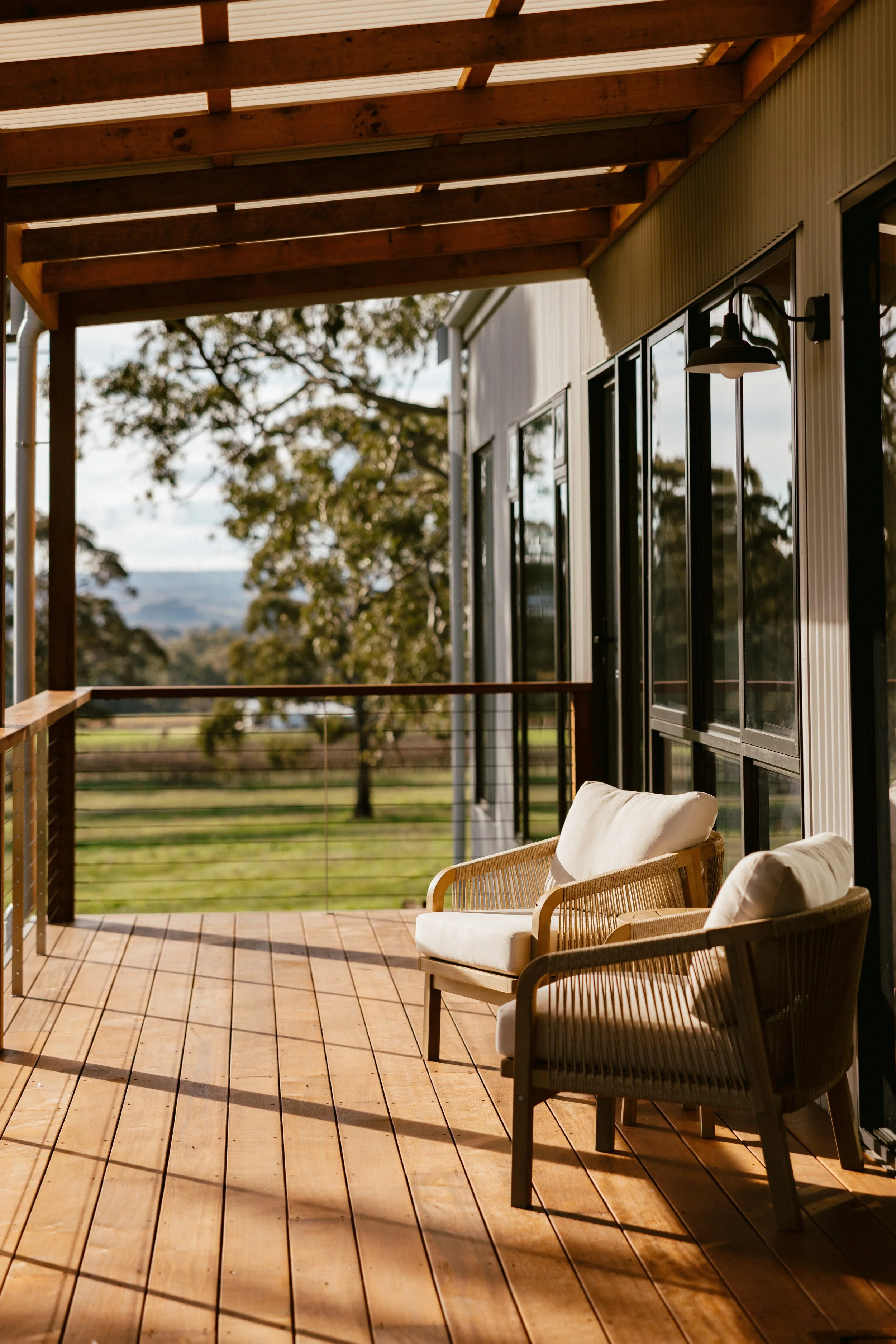 Sun soaked balcony lounge chairs, perfect for a pre-dinner cheese platter and wine tasting