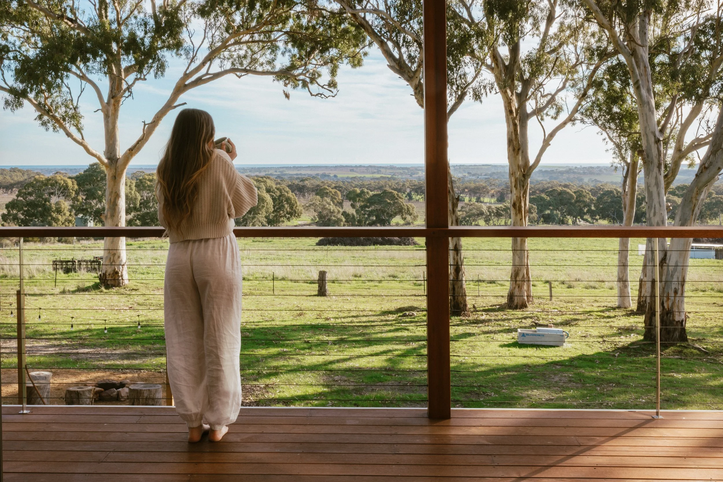 Private balcony with breathtaking sunset views over vineyards to the coast