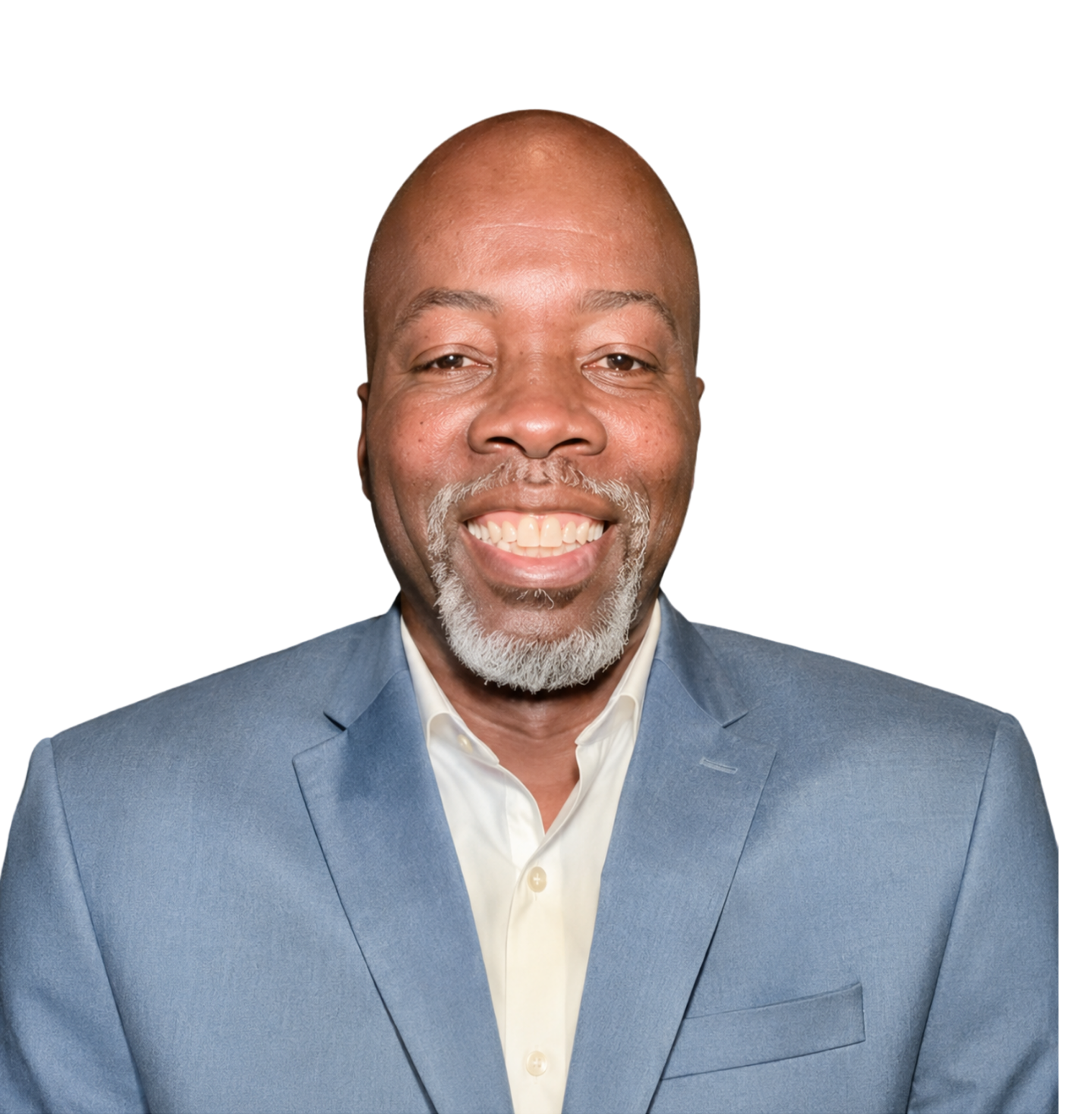 Close-up of smiling African American man wearing a blue suit and white shirt, with a bald head and gray beard.