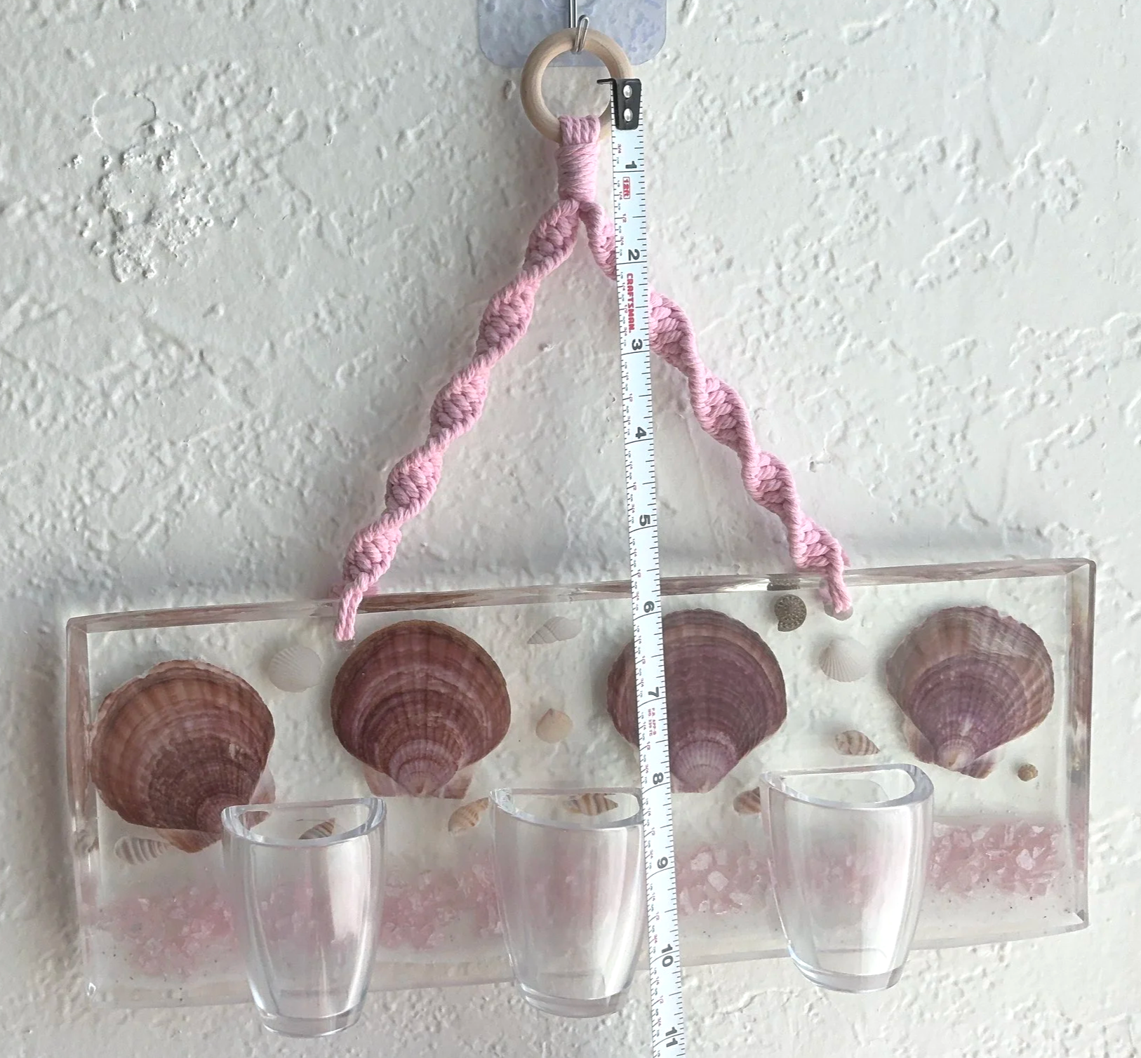 Full hanging coastal wall planter shown beside a vertical measuring tape to demonstrate the approximate overall height from wooden hanging ring to bottom of the vessels.