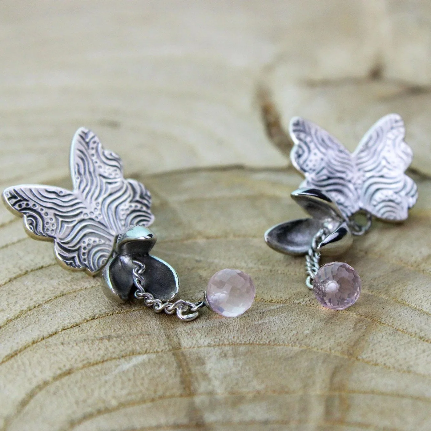 wingandbloomearrings2.jpg