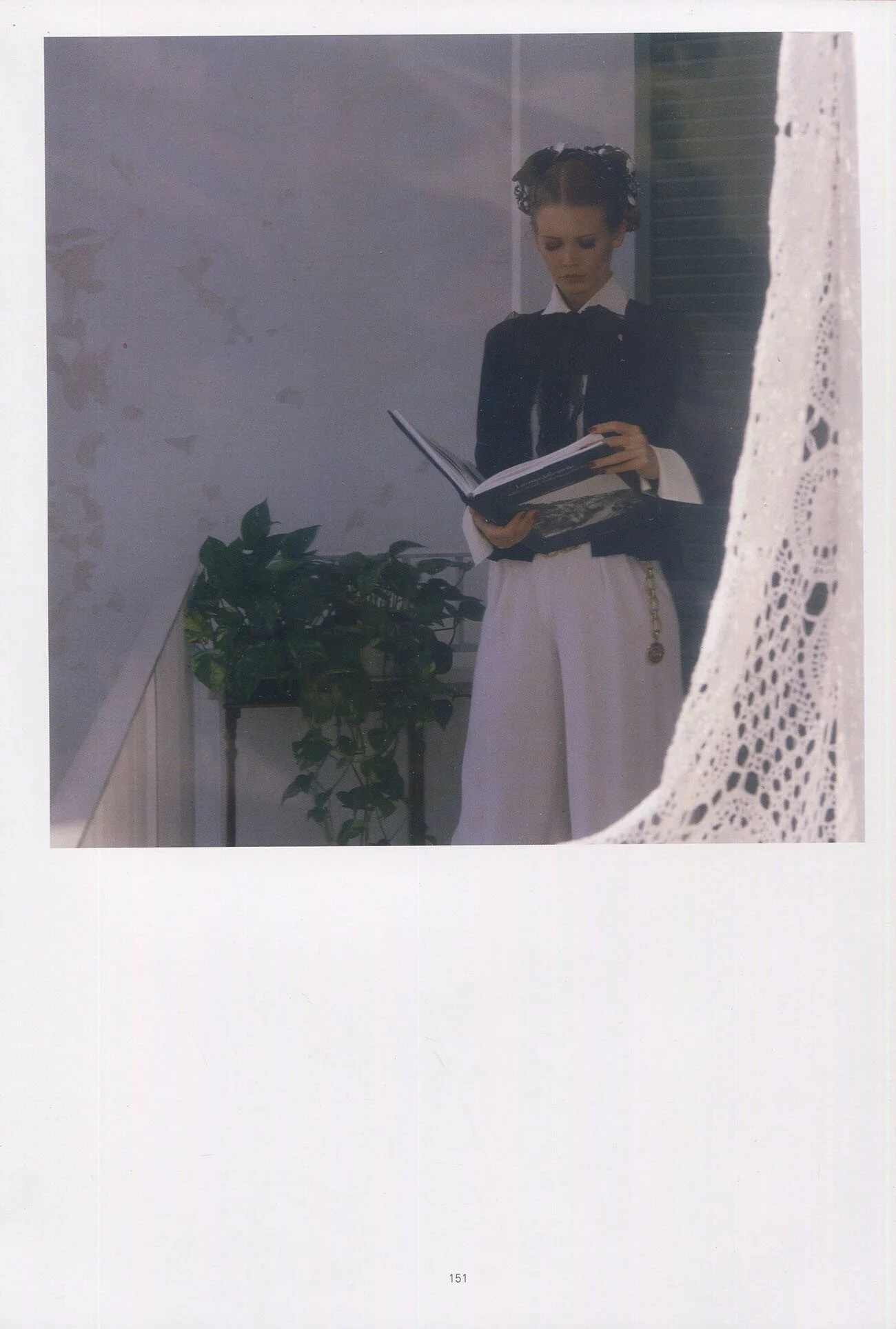 Claudia Schiffer reading a book, Chanel 1993