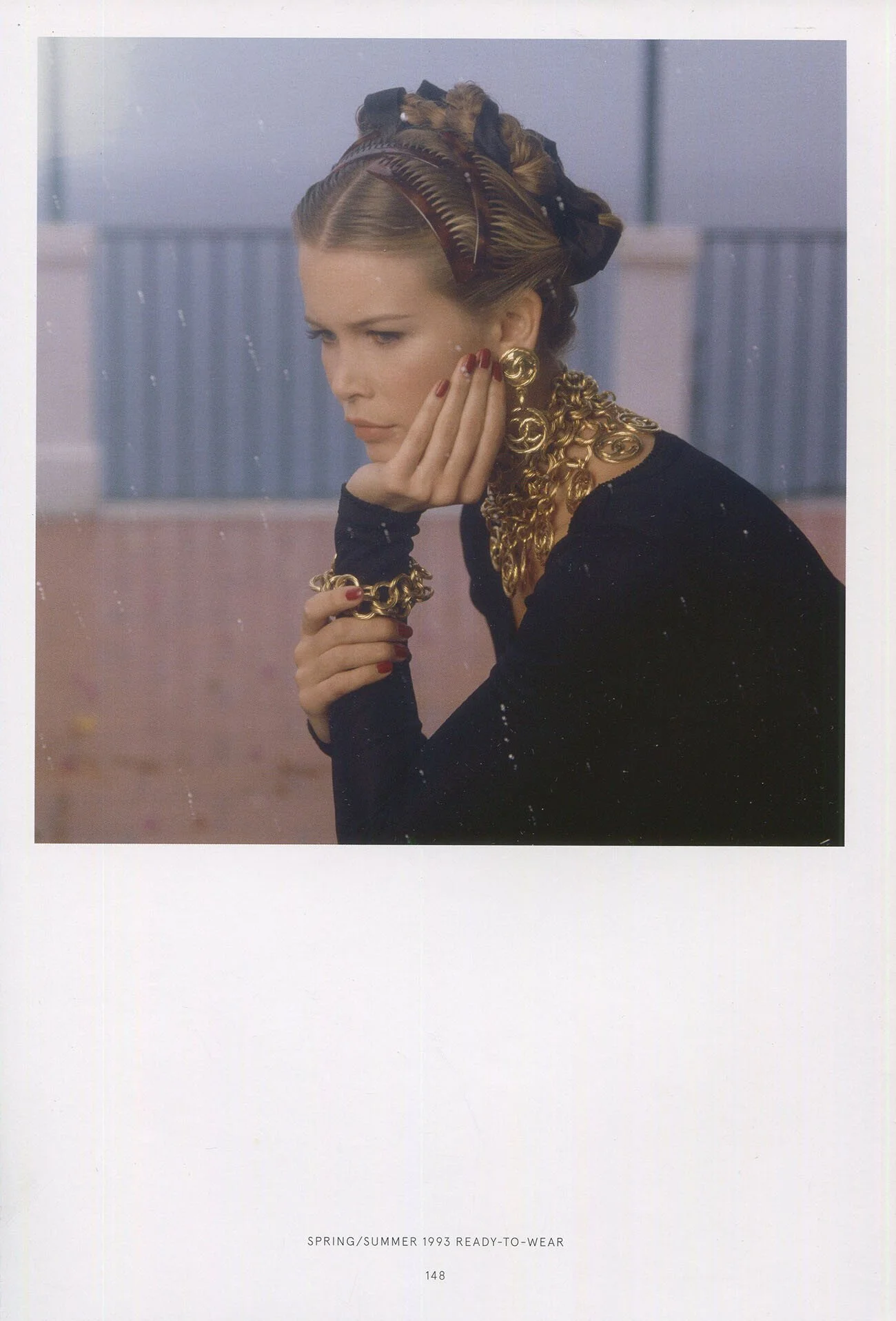 Claudia Schiffer in Chanel, hair combs and gold jewellery