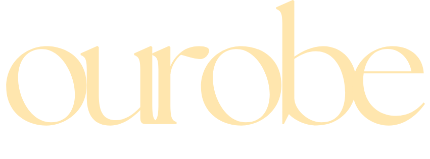 The word "ourrobe" written in large, elegant pale yellow letters on a transparent background.