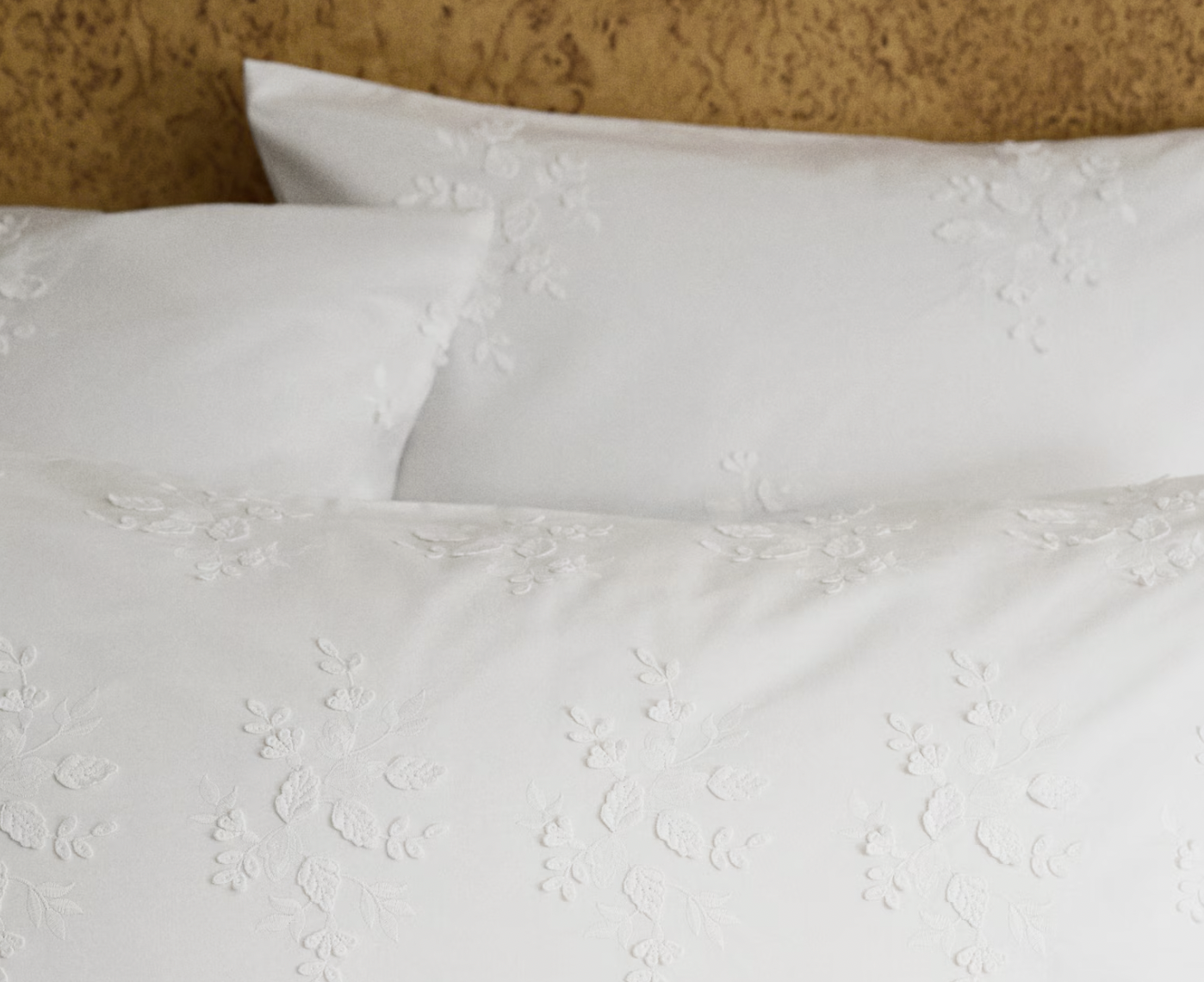  H&M  
Embroidered Cotton Pillowcase 
$29.99