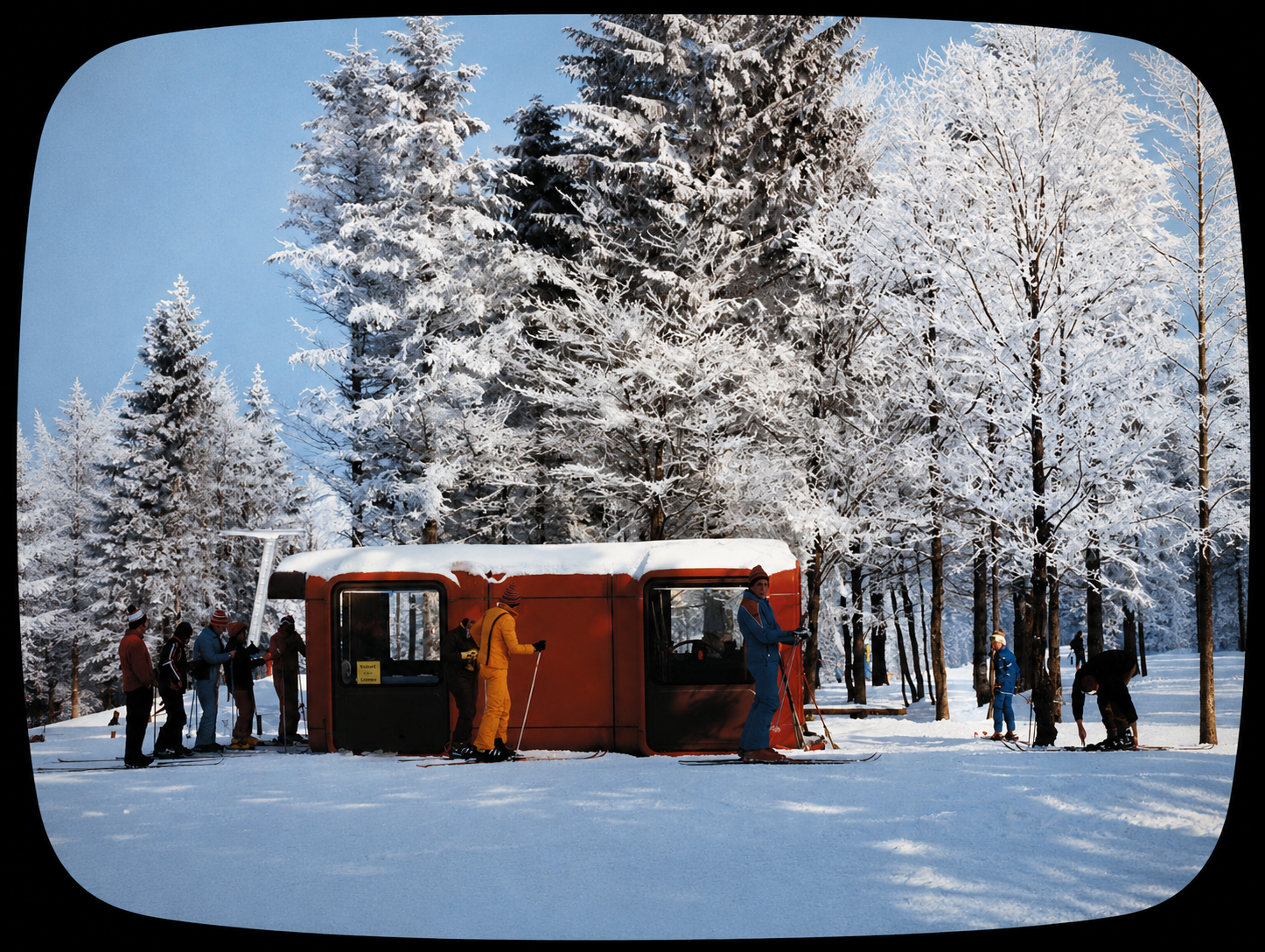 Group of people in winter clothing waiting in line for a snow train in a snowy forest with tall snow-covered trees under a clear blue sky.