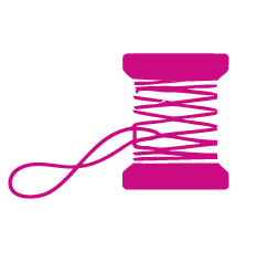 Pink sewing spool with thread and needle