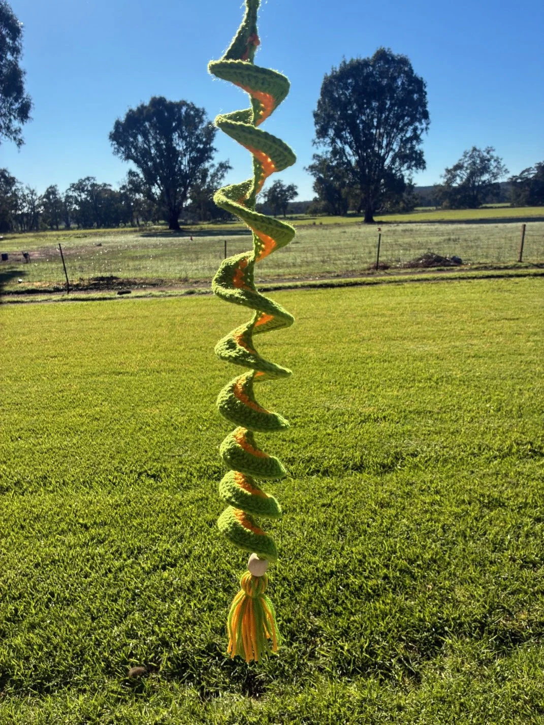 green and gold wind spinner.jpeg