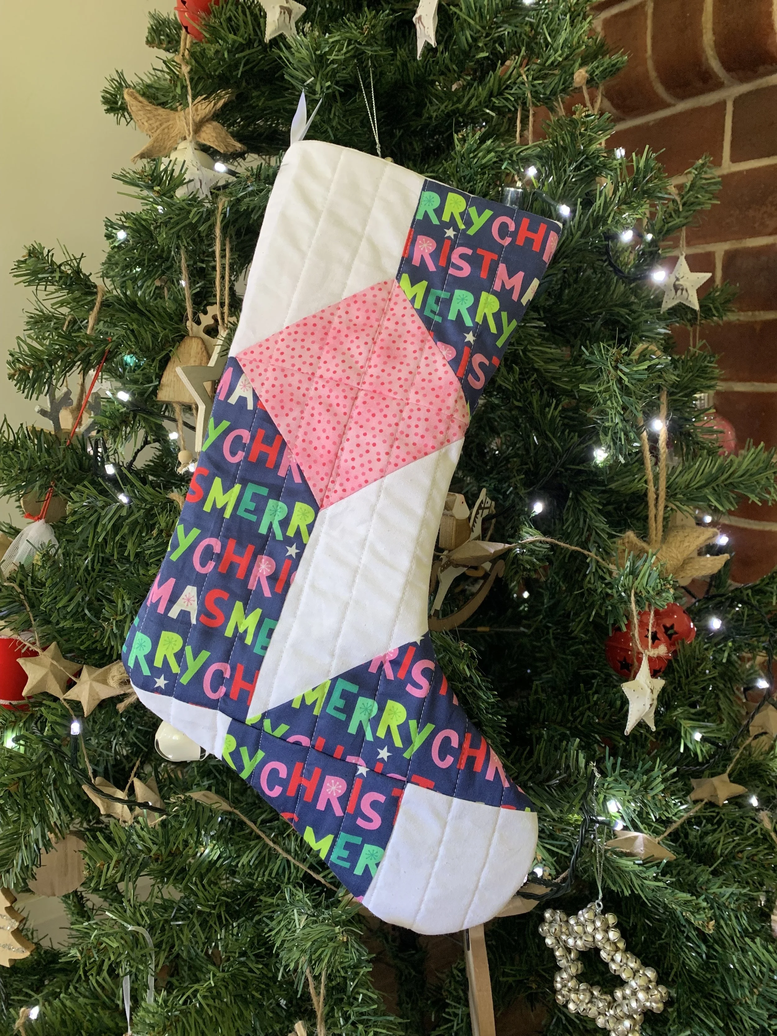 Christmas Stocking hanging on Christmas Tree