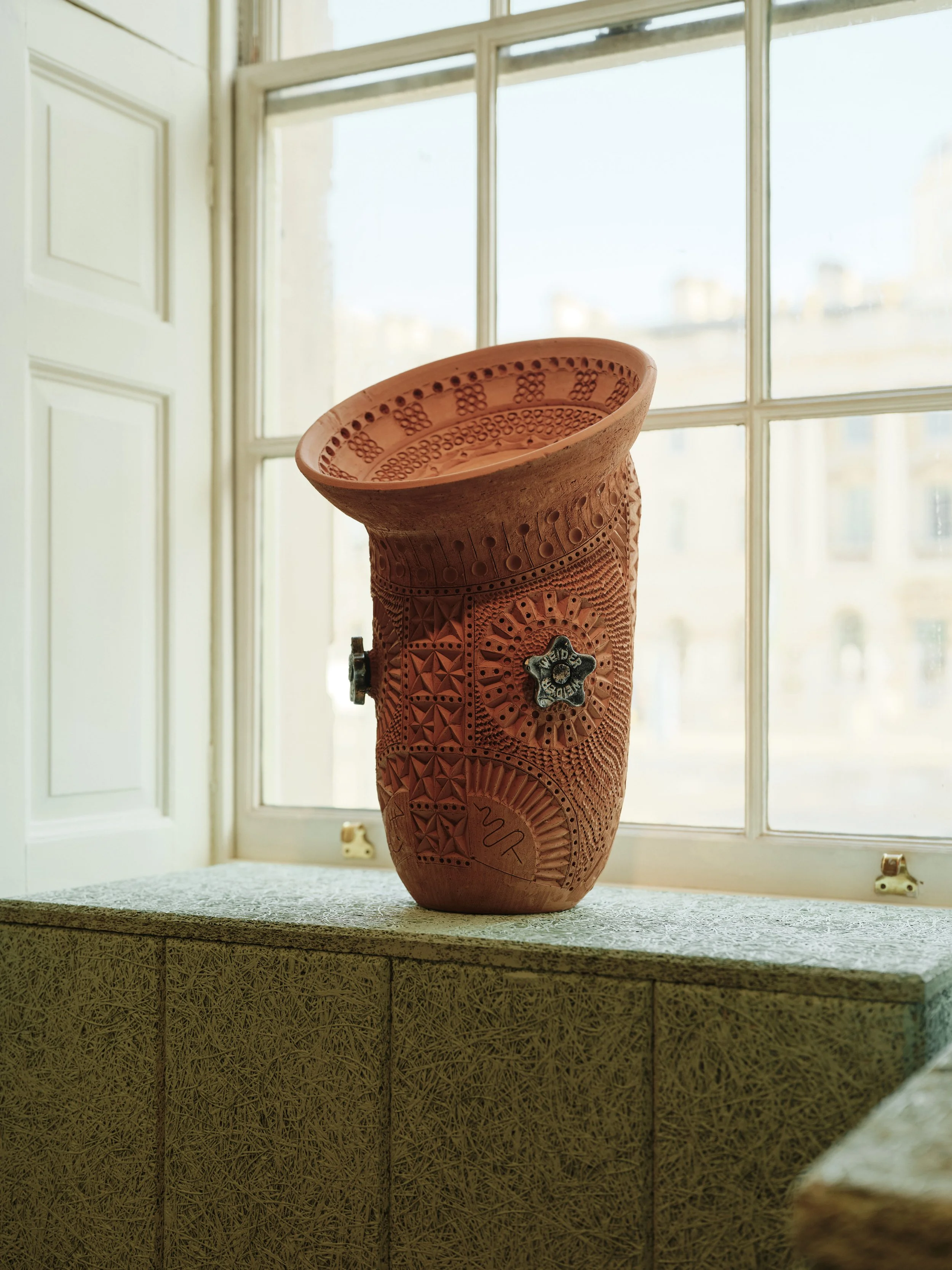 Interior design for Collect Art fair by Tola Ojuolape Studio, photography by Shin Miura, textured green lounge with humble materials used in an elevated manner for the installation design by Tola