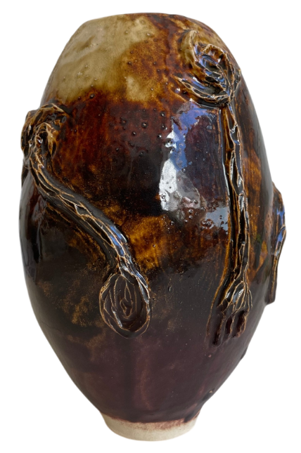 SToneware vase with brown glazing and abstract flower motif